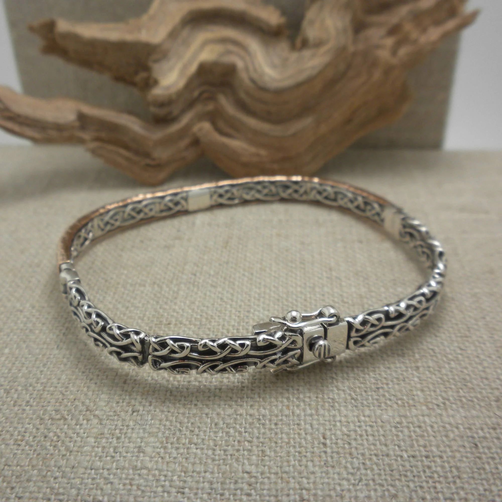 Sterling Silver and Bronze Celtic Bangle with Lab Sapphire
