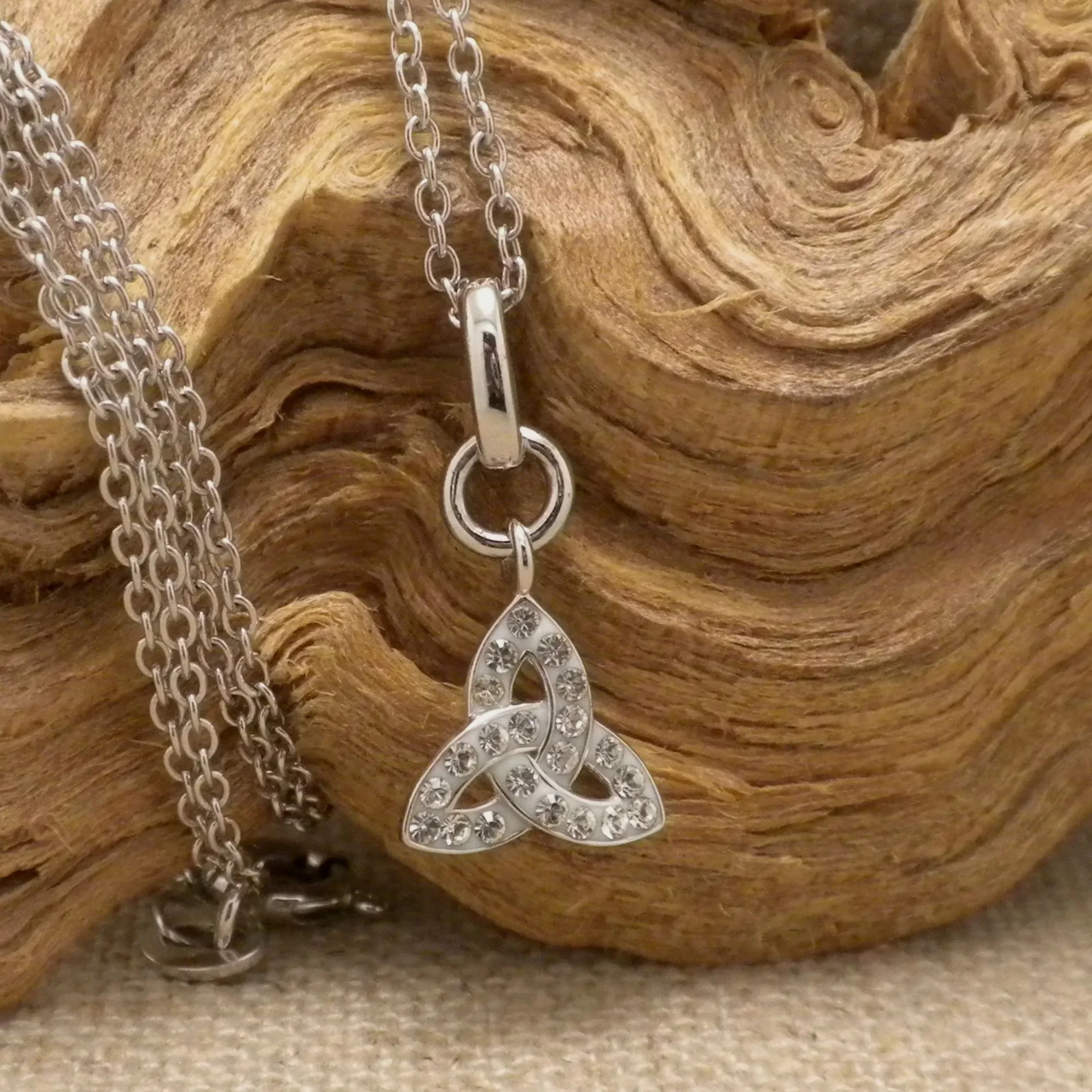 Small Trinity Knot Pendant with white crystals.