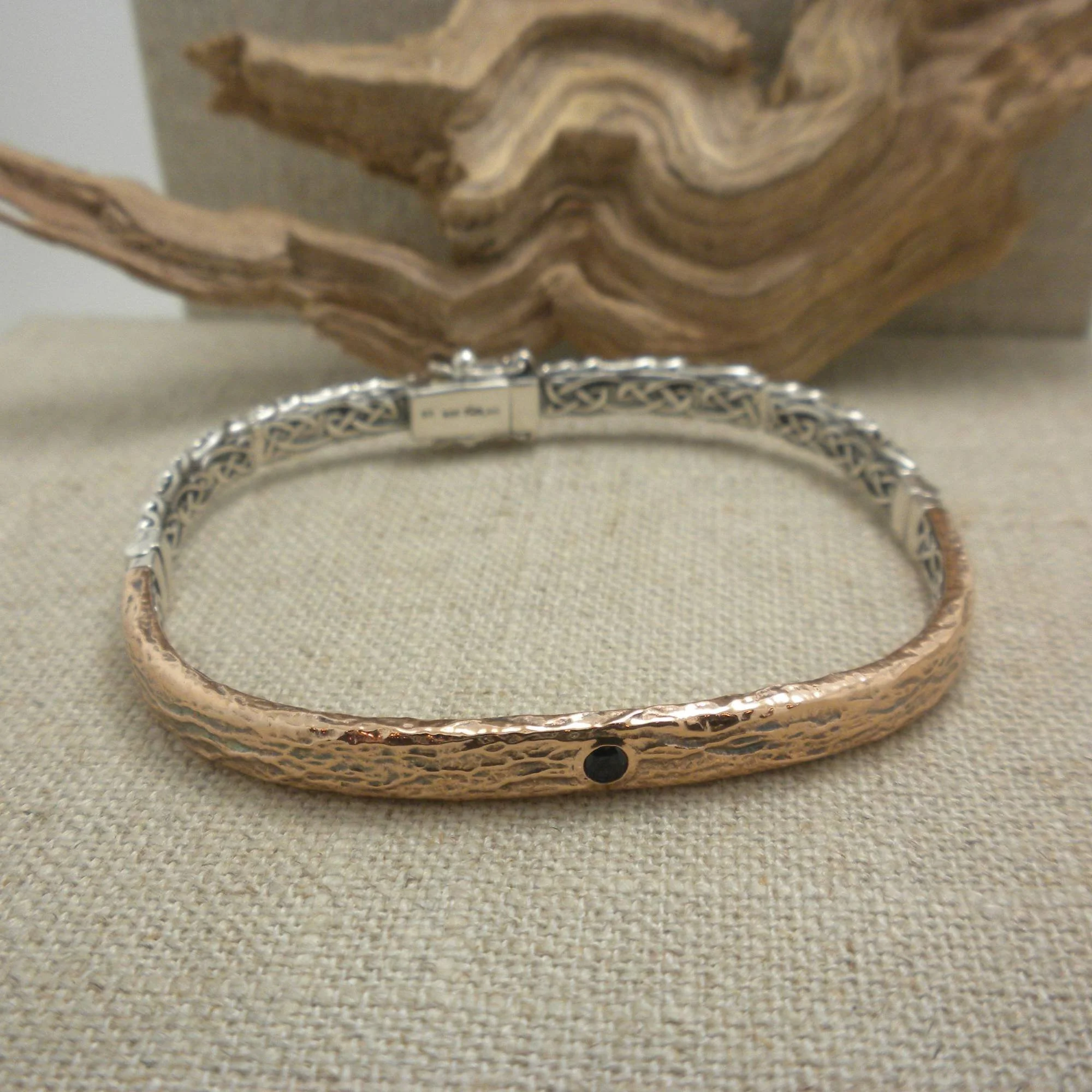 Sterling Silver and Bronze Celtic Bangle with Lab Sapphire