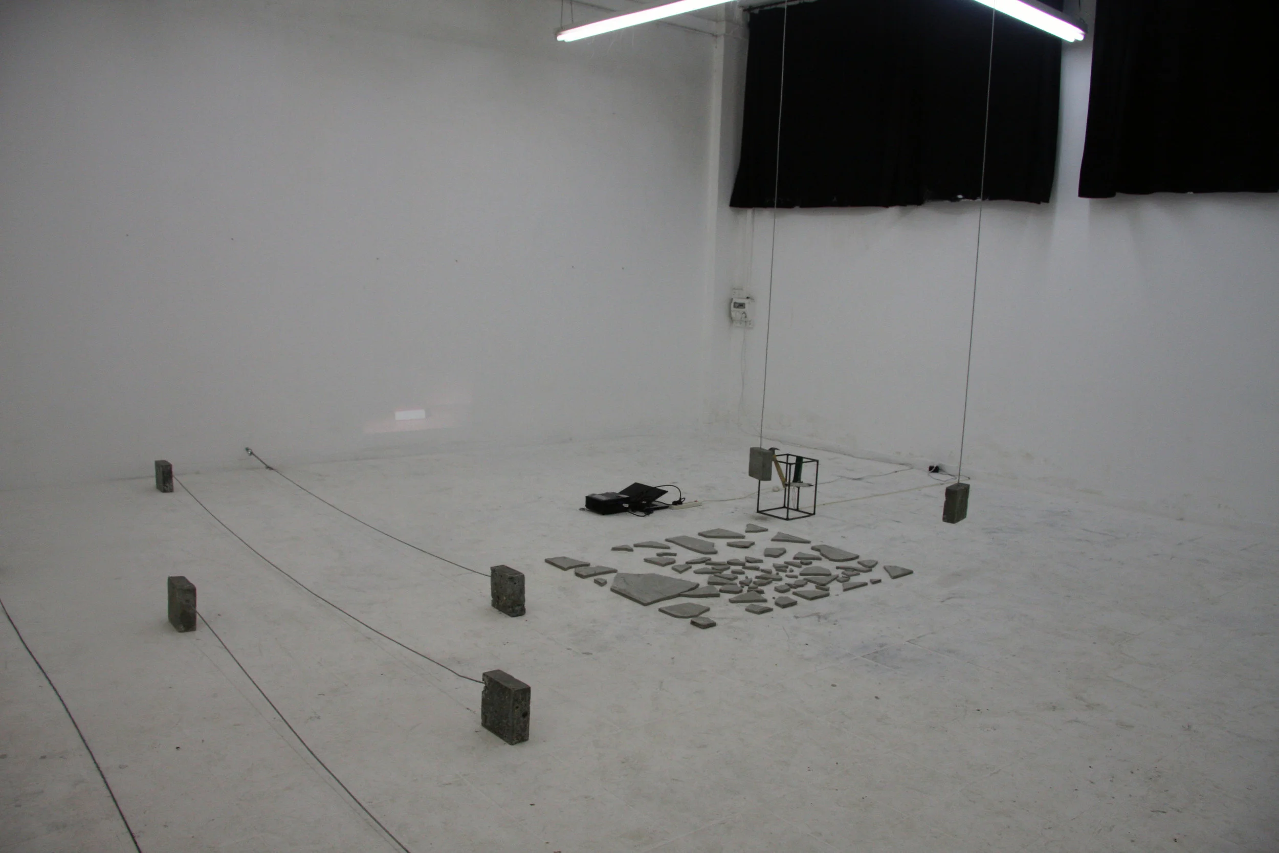 "Force of nature" Variable sizes, concrete, metal wire, ,metal rods, motor, hammer, video screening, 2011 