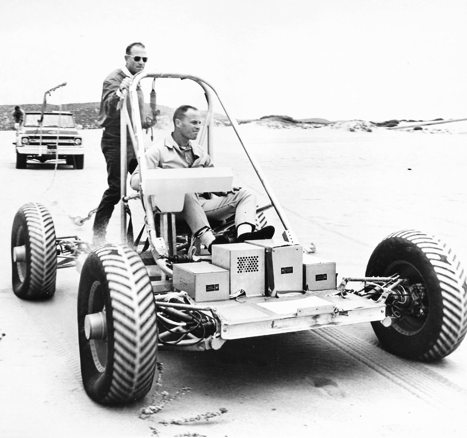 Astronauts Lousma and Carr in the Lunar Rover Mobility Test Vehicle