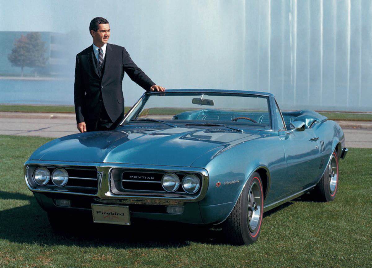 John DeLorean at GM with his new 1967 Firebird.