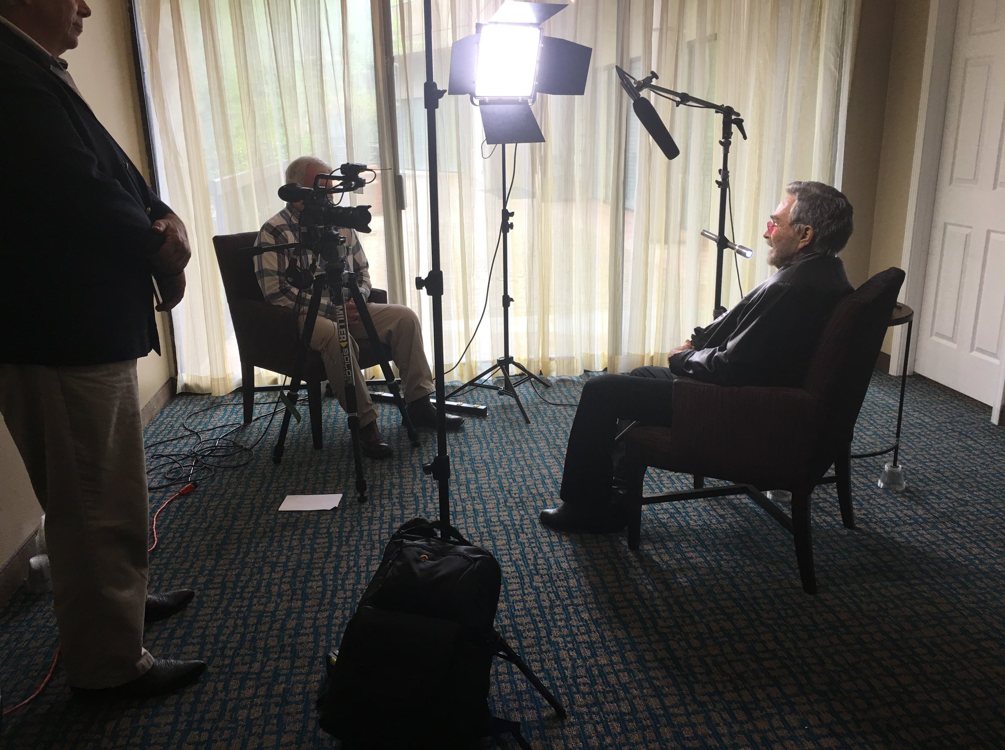 Alex Money interviewing Burt Reynolds for "Norwood, Where Legends Were Born"