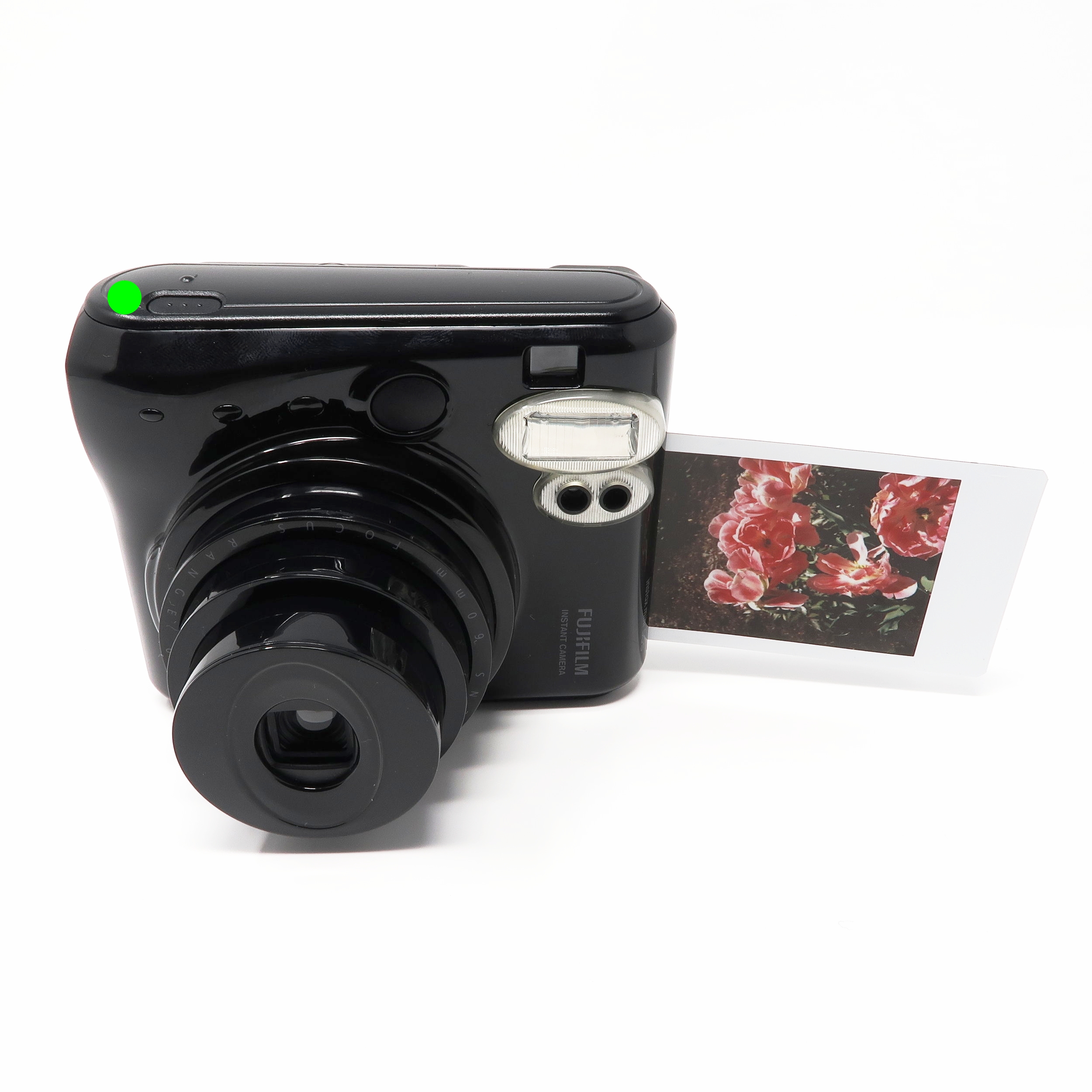Fuji Instax Mini 50S shutter release button specifically designed for landscape orientated photos.
