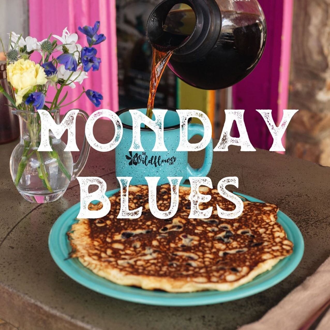 The Monday blues look a little different over here at The Wildflower Cafe 🫐 🥞 Come wake up with a hot cup of coffee and @chefthebear famous blueberry pancakes!