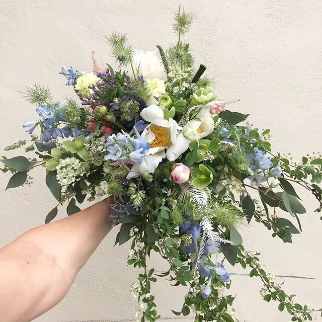 A wild flower bouquet with a little shaping. Intentional placement . The peonies were still closed from the cooler and I didn&rsquo;t get a picture with them open . The bride got a news interview while picking up . With all the changes that happened 