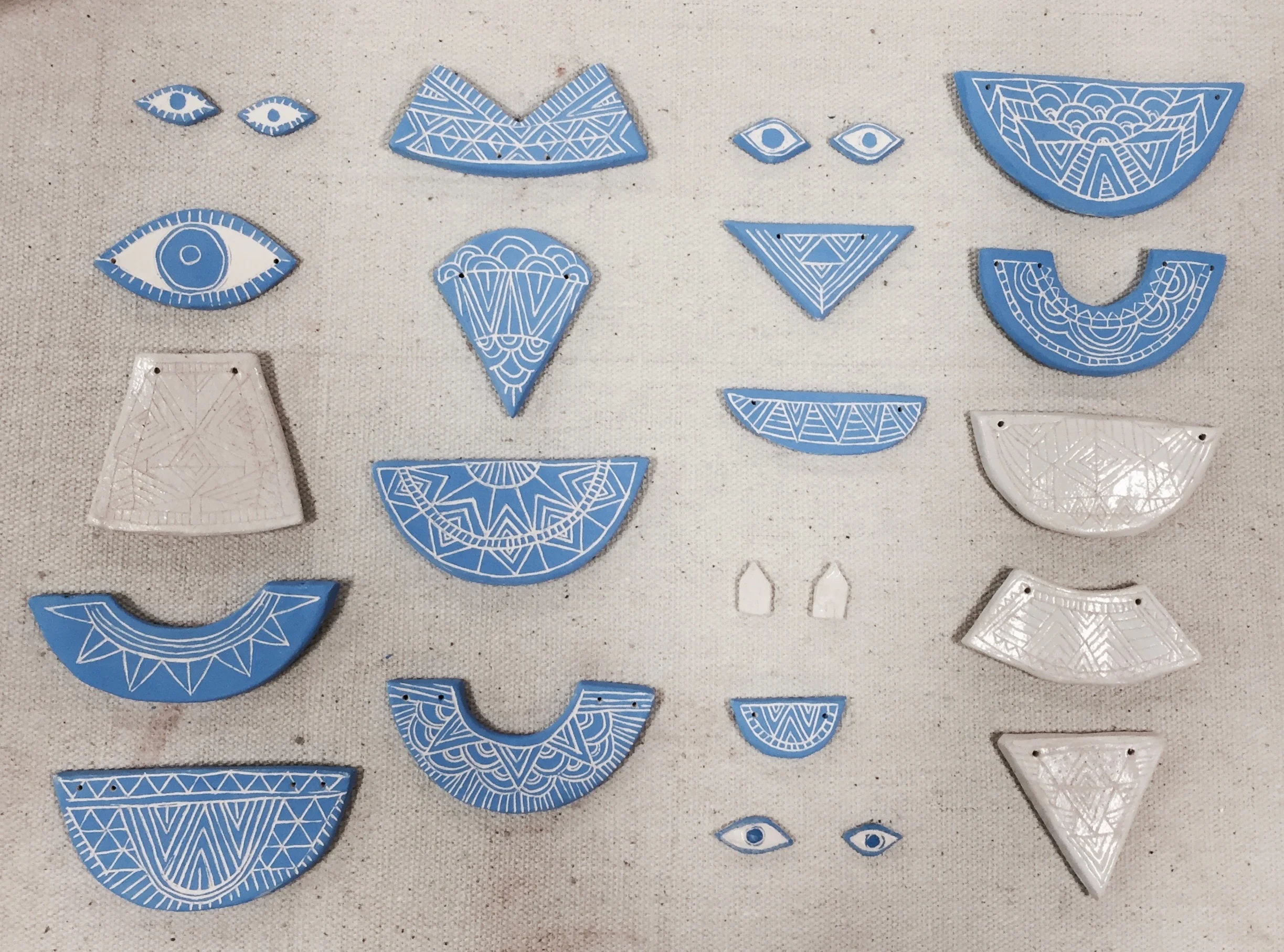 At the end of the school year, I find myself rescuing materials that can't be stored and won't be used over the summer. These clay experiments are made from a mixture of stoneware and raku clay. It had been a long time since I'd filled a kiln with m…