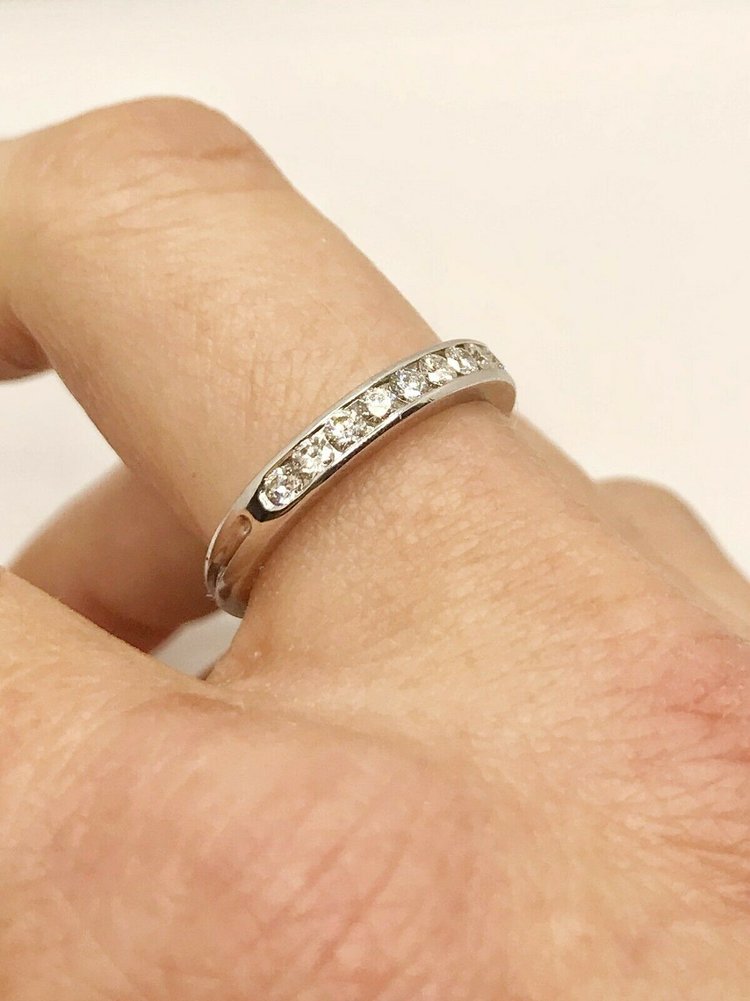 The Tiffany® Setting Engagement Ring with a Channel-set Diamond Band in  Platinum