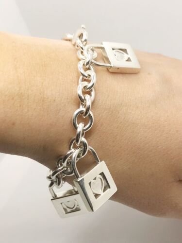 Tiffany & Co. Sterling Silver Heart Charm Bracelet Size 7.75 — DeWitt's  Diamond & Gold Exchange