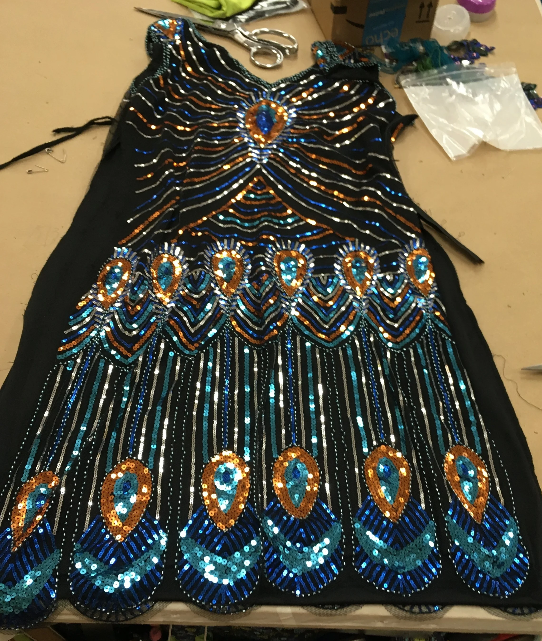   Sequined &nbsp;skirt trim was harvested from dress.  
