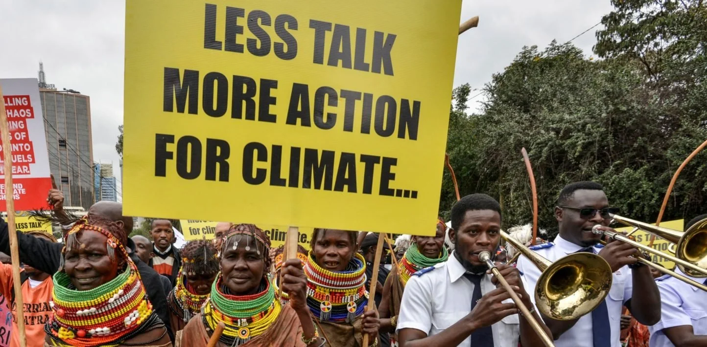 Documents of Disaster and Conferences of Calamity: Rhetorical Questions, Questions of Rhetoric and the Transition  from Fossil Fuels
