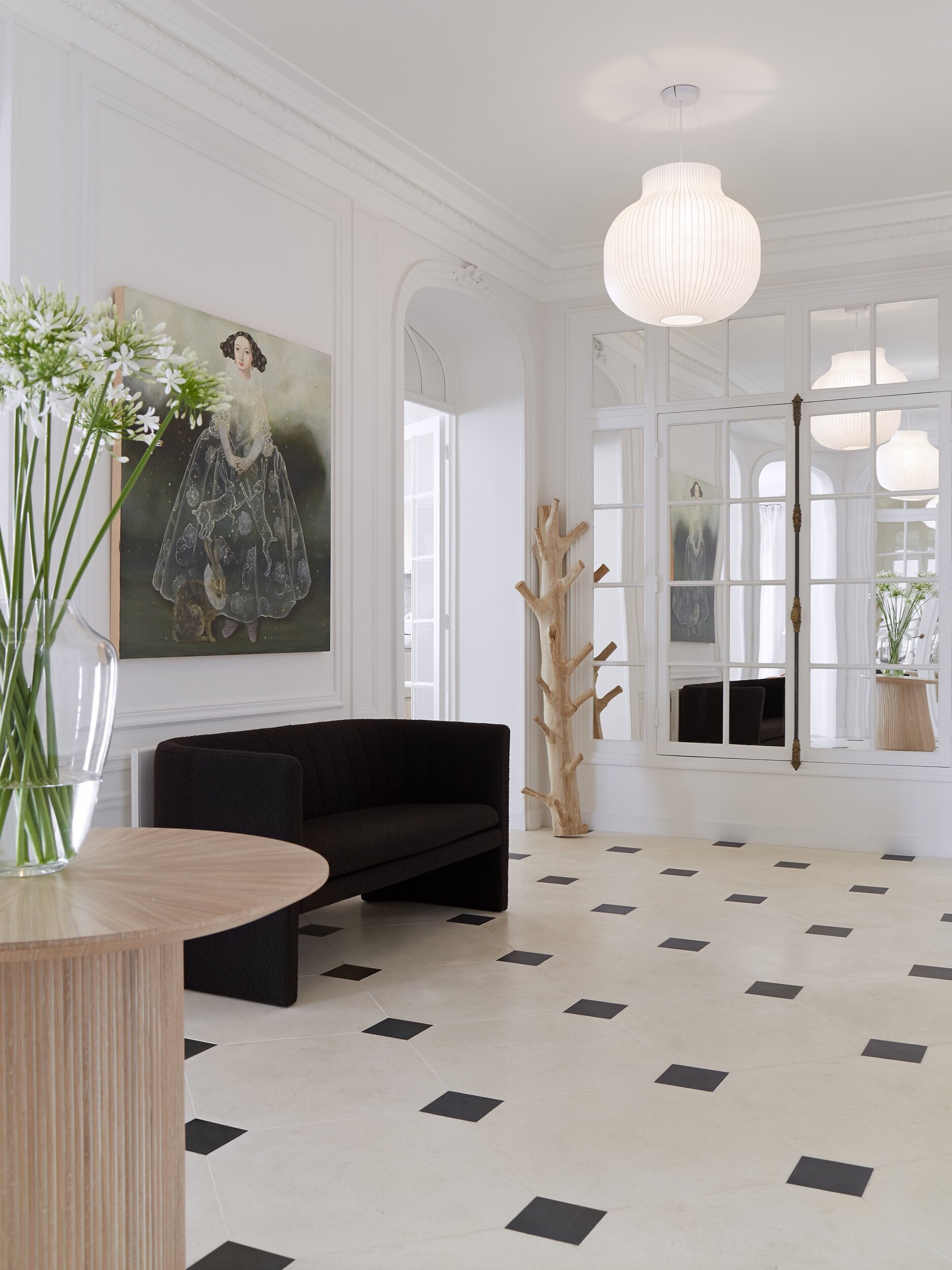 Newly renovated apartment with black and white tiles