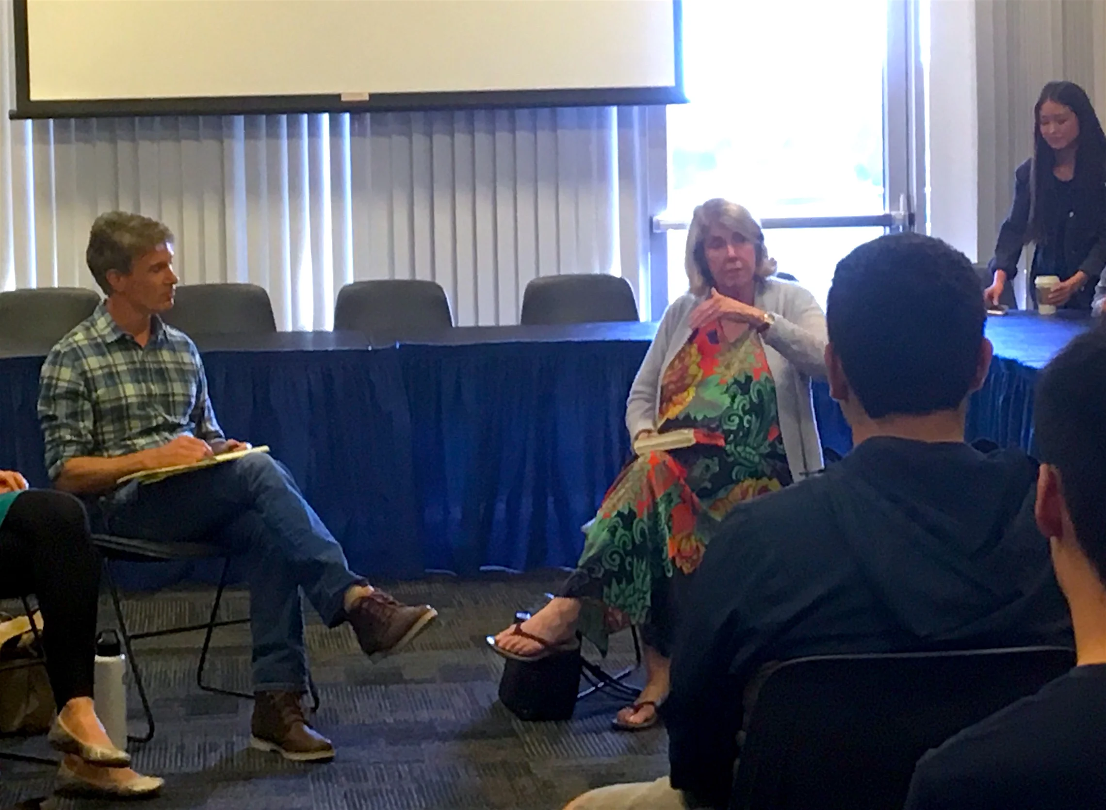 Writing Program Lecturer Christian Thomas takes notes during a workshop with John Hopkins University psychologist Kay Redfield Jamison, author of An Unquiet Mind: A Memoir of Moods and Madness .