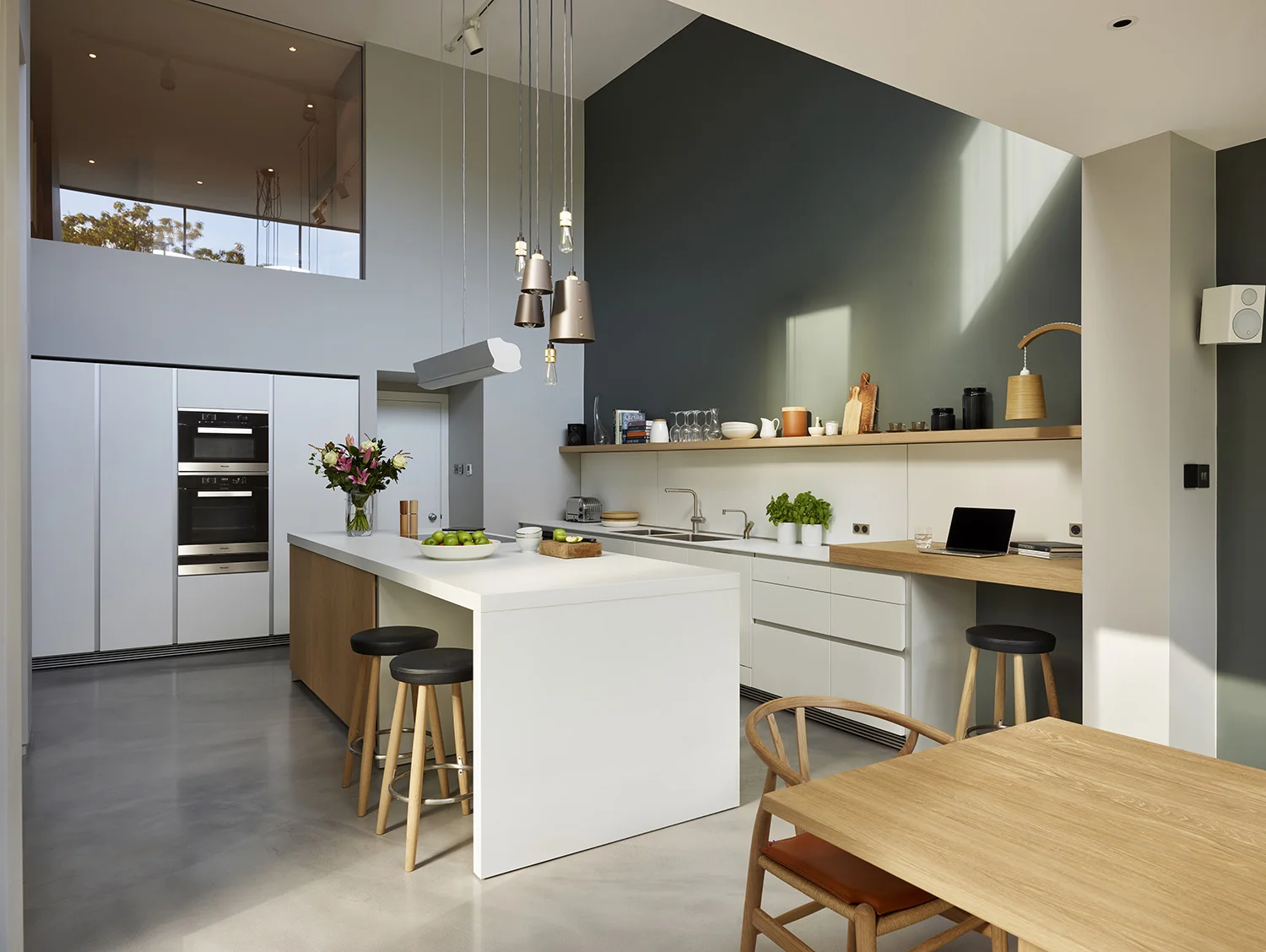 When I originally saw this large house near Richmond it was a maze of rooms with no real flow. Working with the Architects Snell David, the brief was to create a coherent home for a young family. Whilst the new parts of the house were contemporary, the classical proportions of the principal rooms required a more formal treatment.