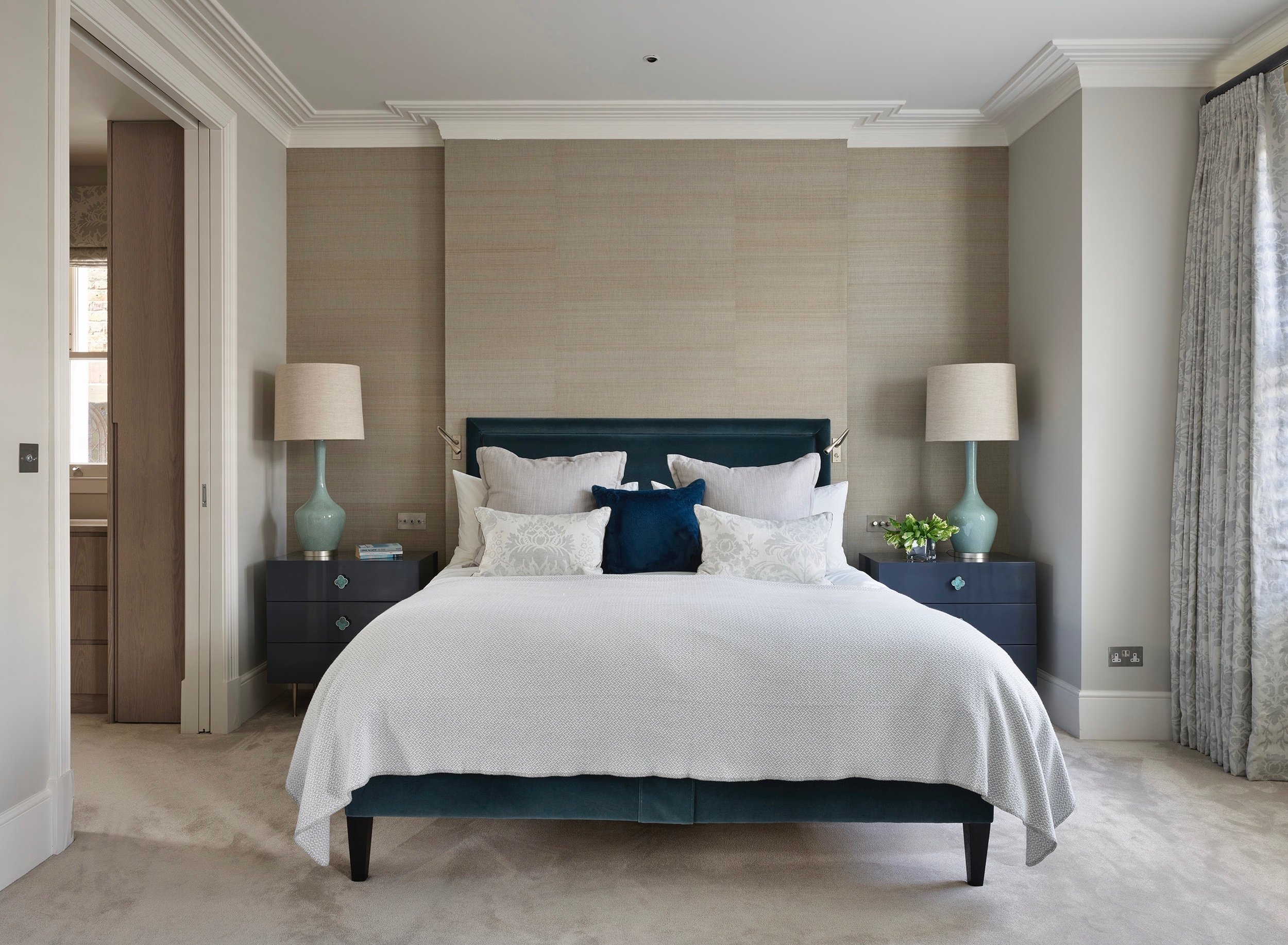 Elegant colours and fabrics create a calming master suite