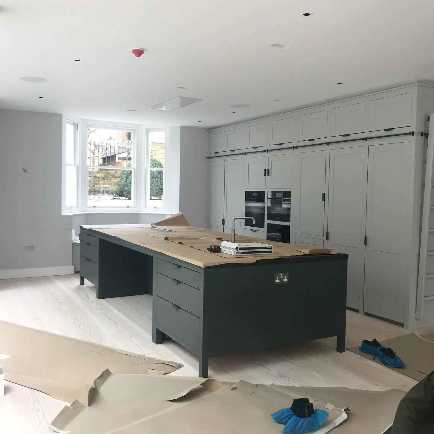 Who wouldn&rsquo;t want to get locked down with a gorgeous kitchen like this #interiordesign #interiorarchitecture #kitcheninstallation #dinesen #windowseat #island #cookingathome