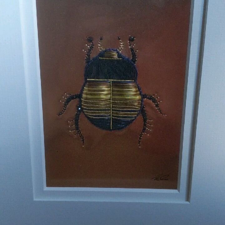 G l i t e r i n g  O n e -  E v e

This lady is inspired by the Chrysina Karshi (Jewel beetle). All my insects are based on real animals although along the way they become species of their own. It's normally during the colouring process that these cr