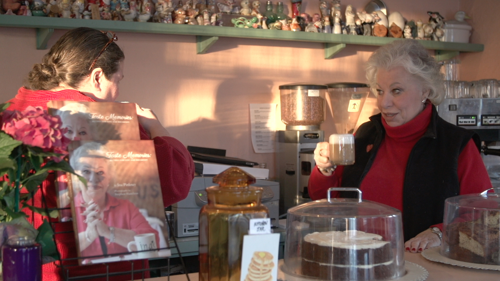 Ina Pinkney and manager Seana click mugs on closing day