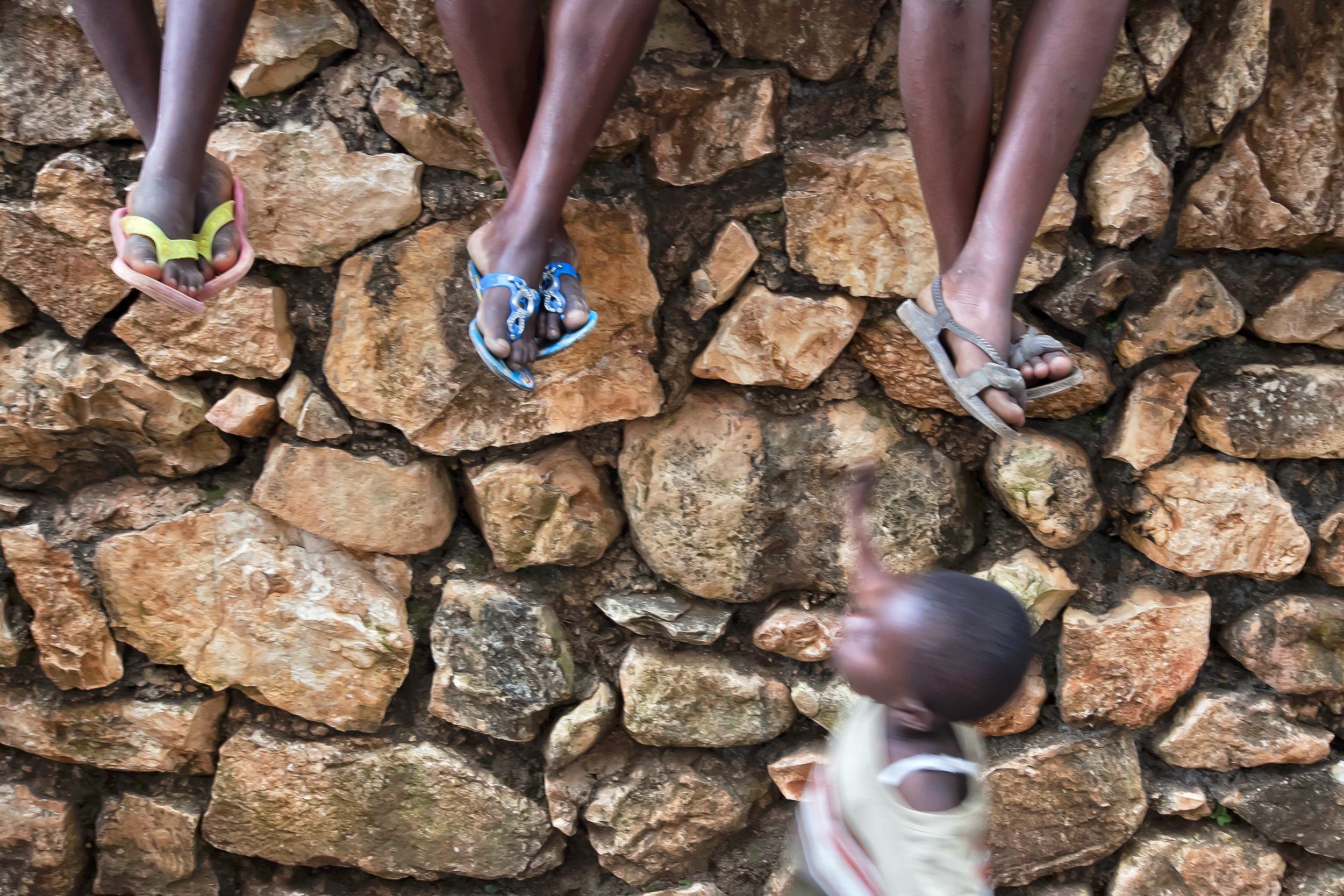  Shoes worn by Haitian children are often worn or broken. 