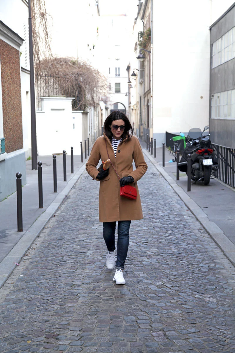 camel-colored-cota-jeans-and-adidas-sneakers-in-paris.jpg