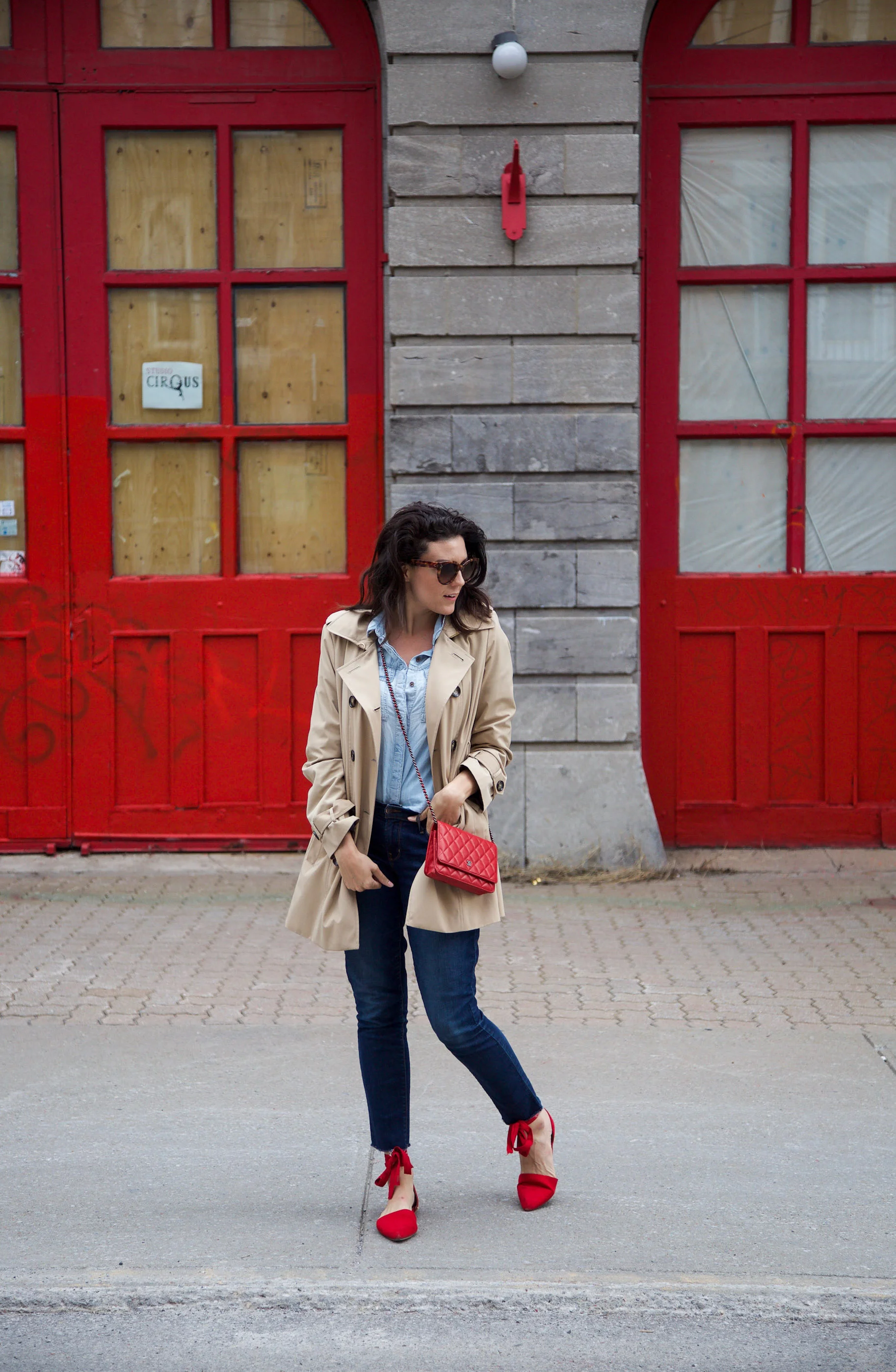 denim-on-denim-outfit-with-trench-coat-and-red-accessories8.jpg