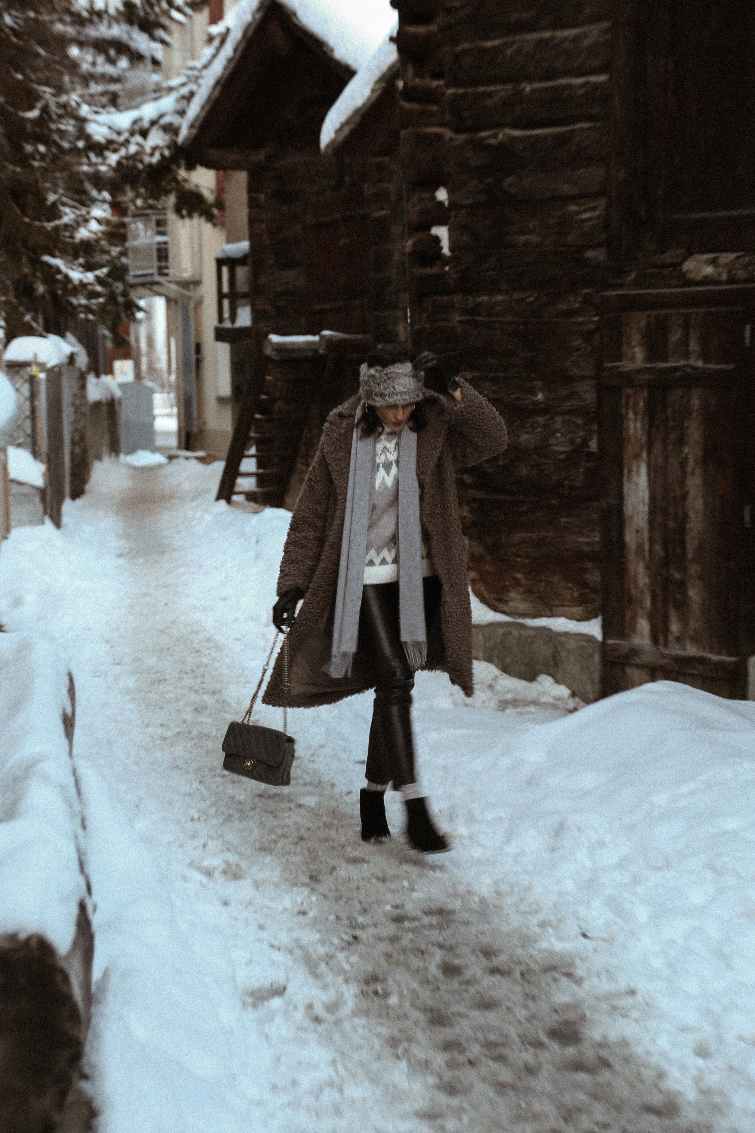woman in alpine sweater in Zermatt