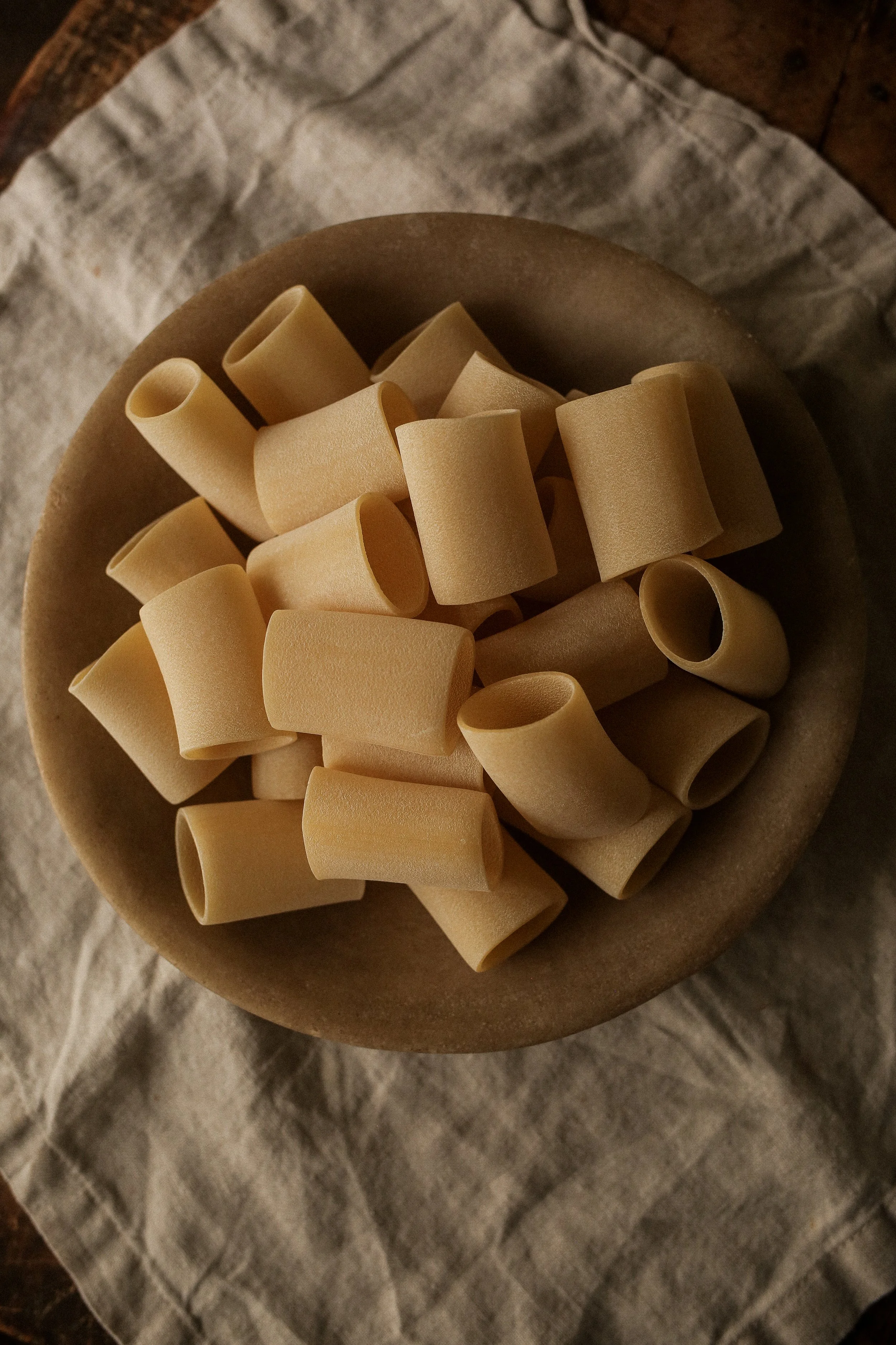 bowl of dried paccheri pasta