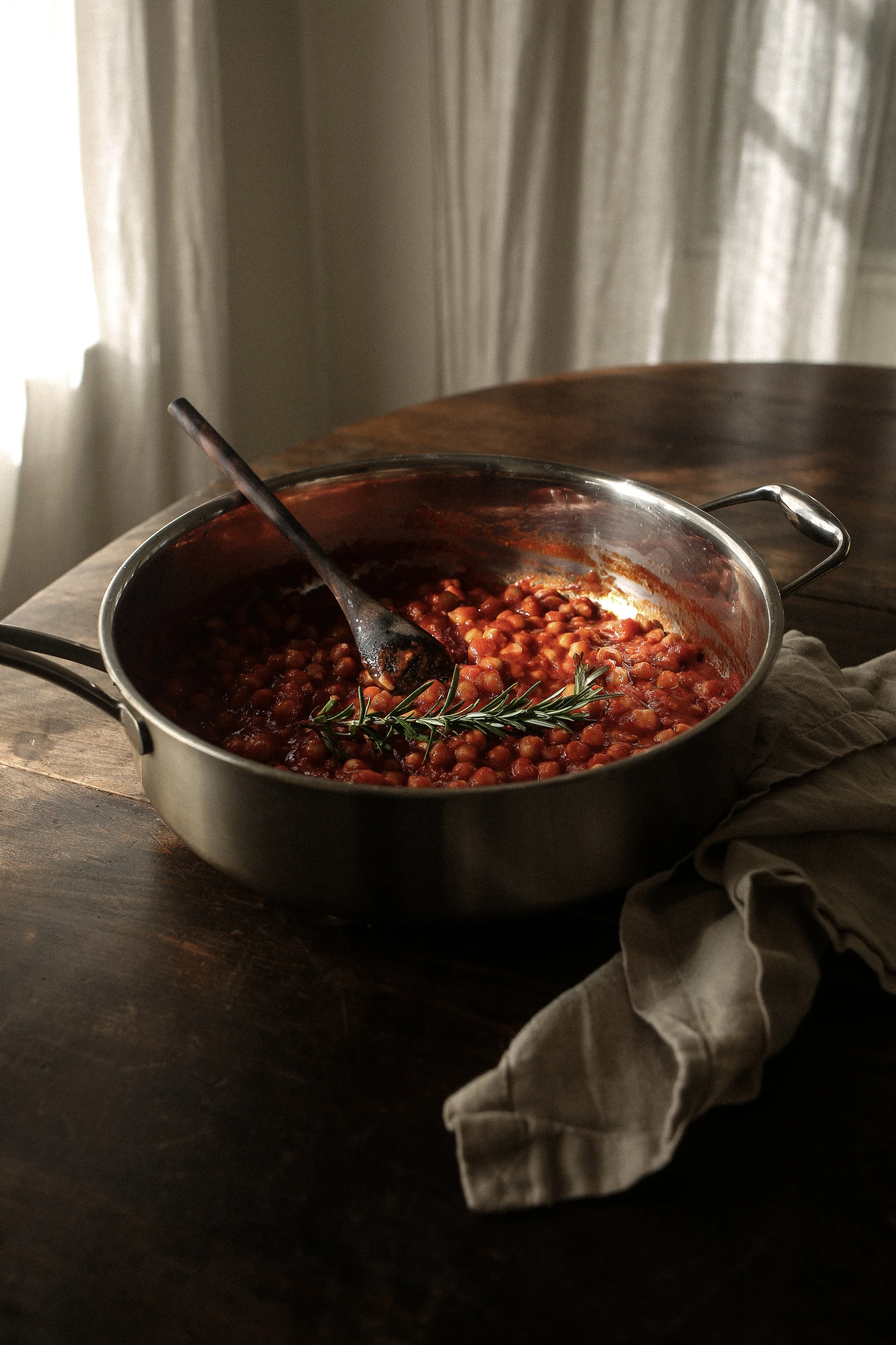 chickpeas in tomato sauce in a pan