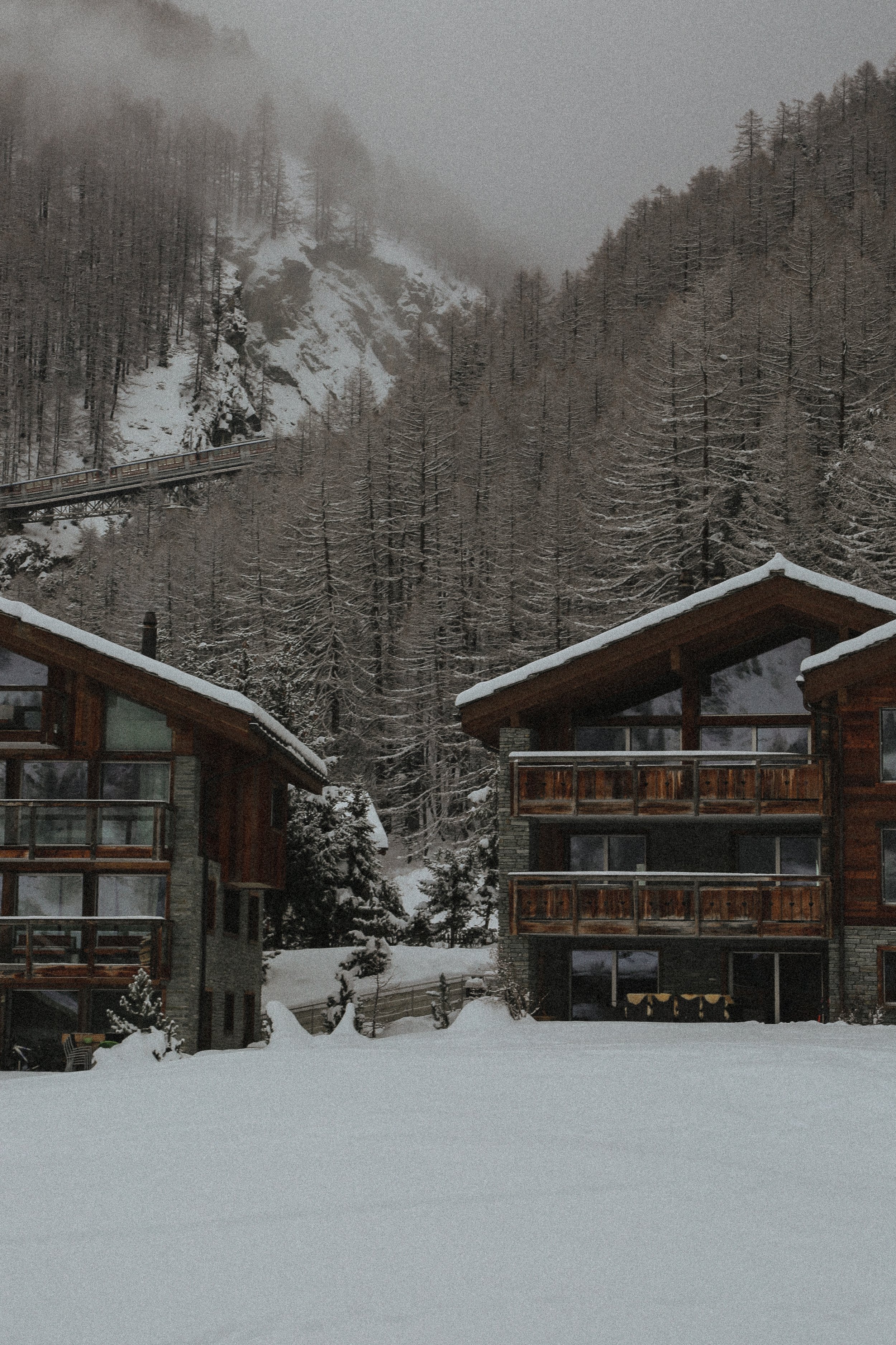 Zermatt winter scene with train and cabins