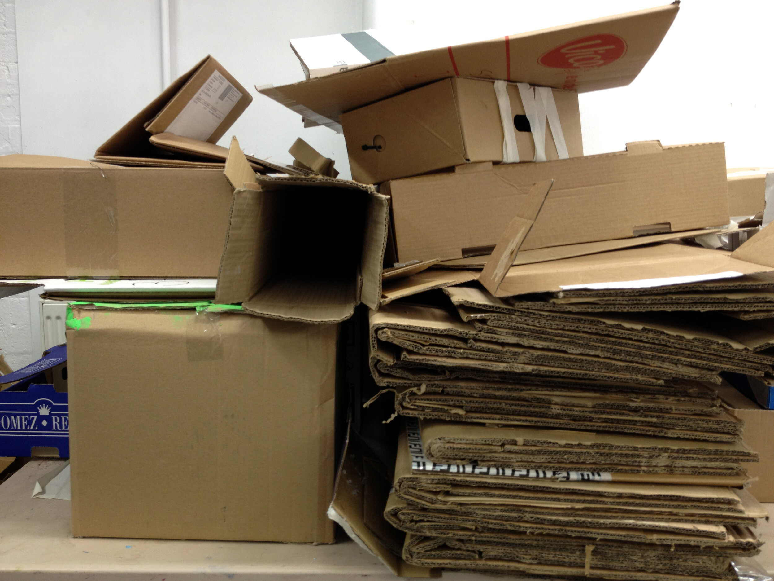 take one pile of cardboard boxes.jpg