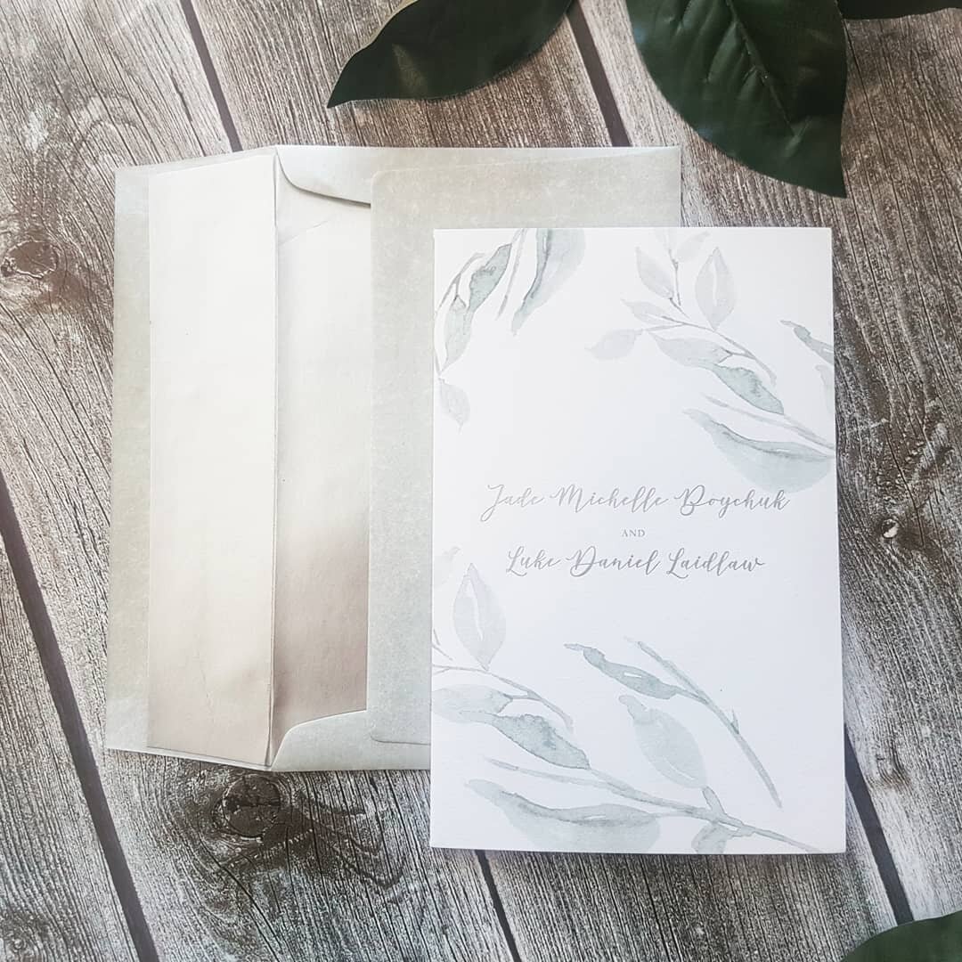 More 📷 of this summer wedding invitation suite that features lush greenery and crisp white cotton paper. Trendy botanical and geometric inspired invitation, with matte silver foil accents and soft gray envelopes, complete with a matte silver envelop