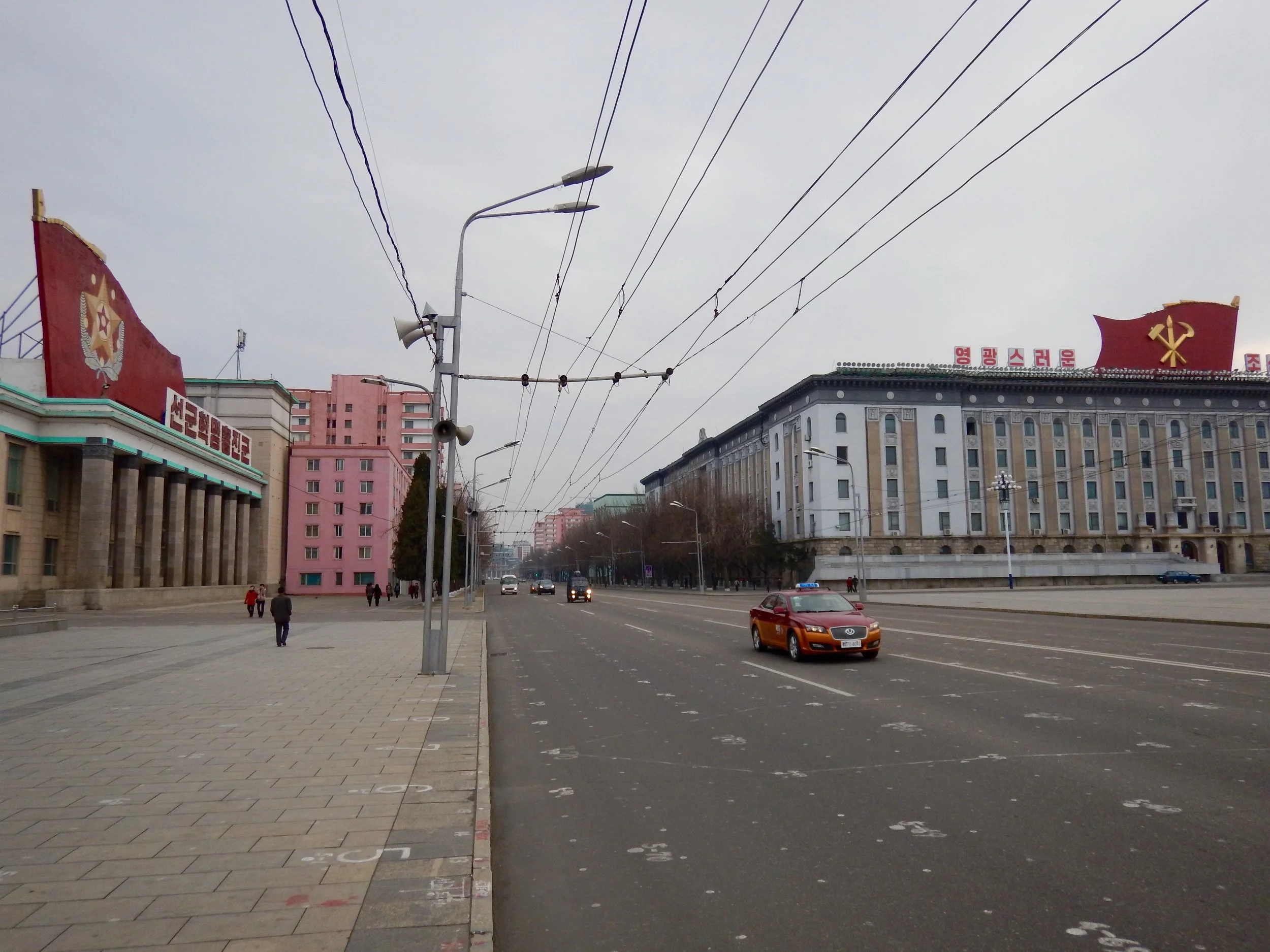 Sungri Street, one of the capital's widest roads, only sees minimal traffic due to the DPRK's low rate of vehicle ownership. (Photo by Ethan Jakob Craft.)