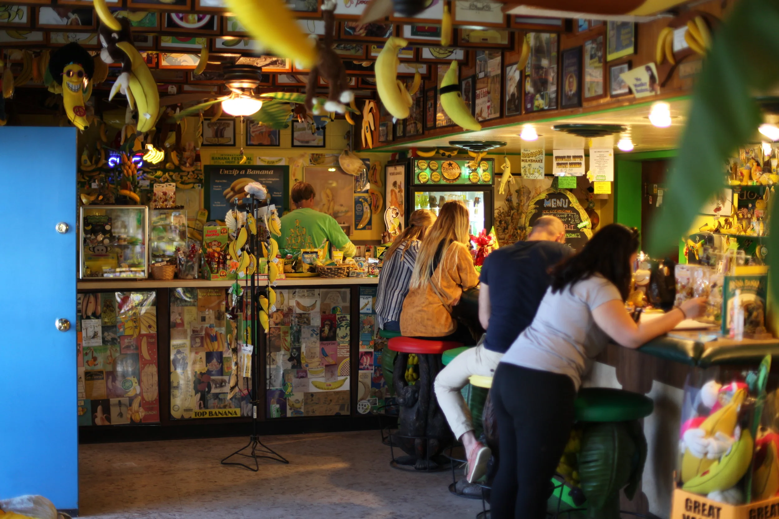 Tourists wait to be served banana-flavoured treats at the International Banana Museum in North Shore, Calif. on Jan. 6, 2017. (Photo by Ethan Jakob Craft.)