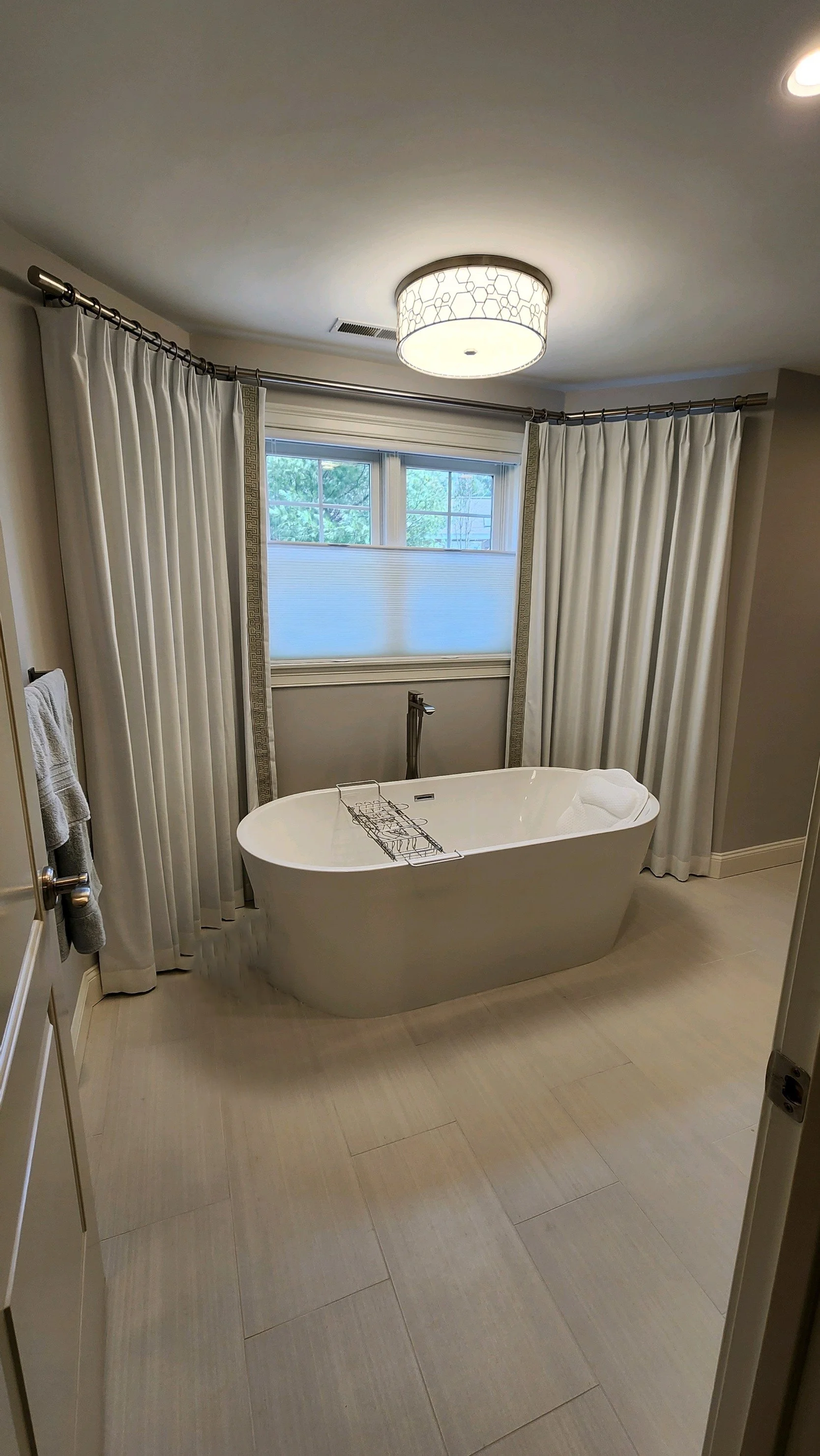Custom blackout lined drapery panels for master bath primary bath