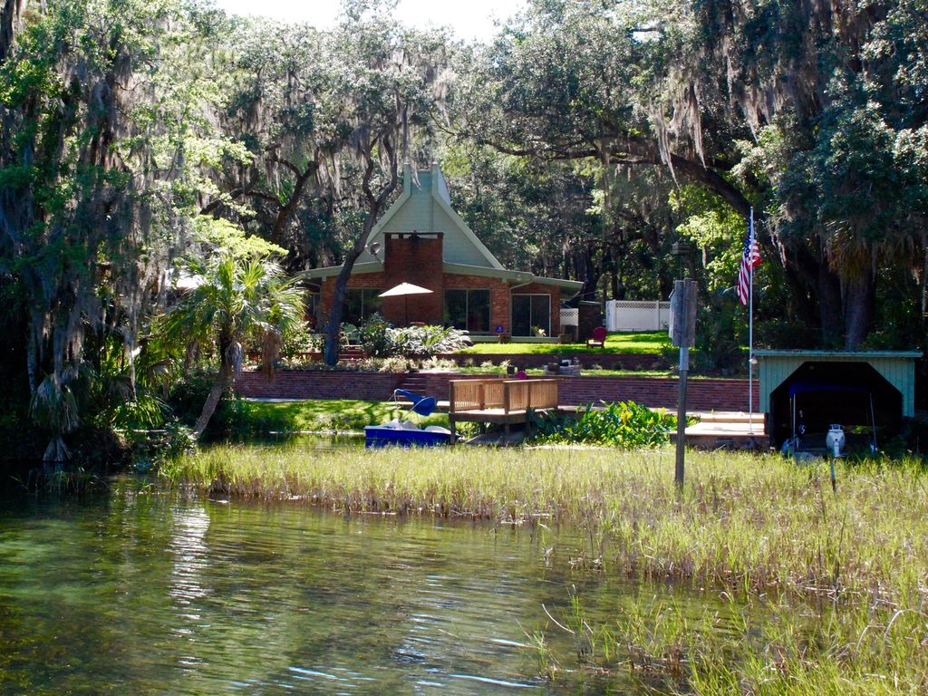  Over 140-feet of prime riverfront with your own private swimming cove. 