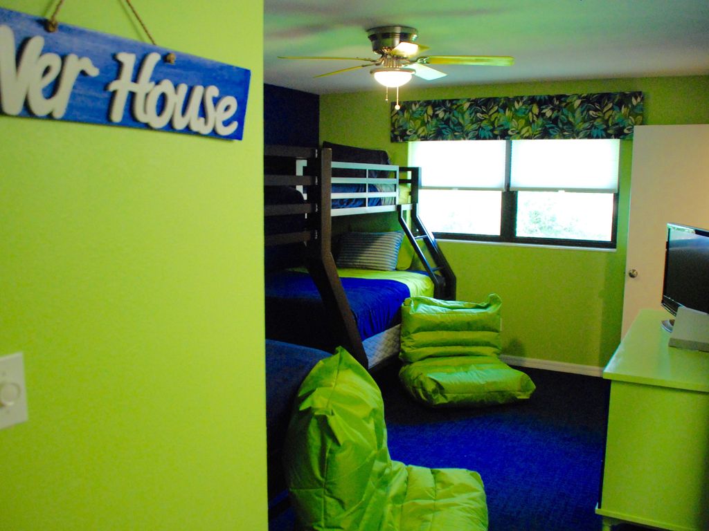  Kids just love our Neon Bunk Room , complete with a Wii game system &amp; bean bags. 