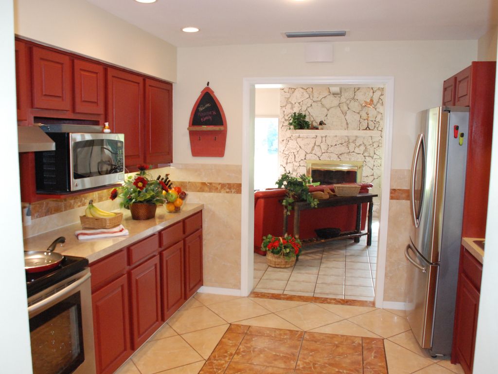  Our all-new gourmet kitchen features top-of-the-line stainless appliances. 