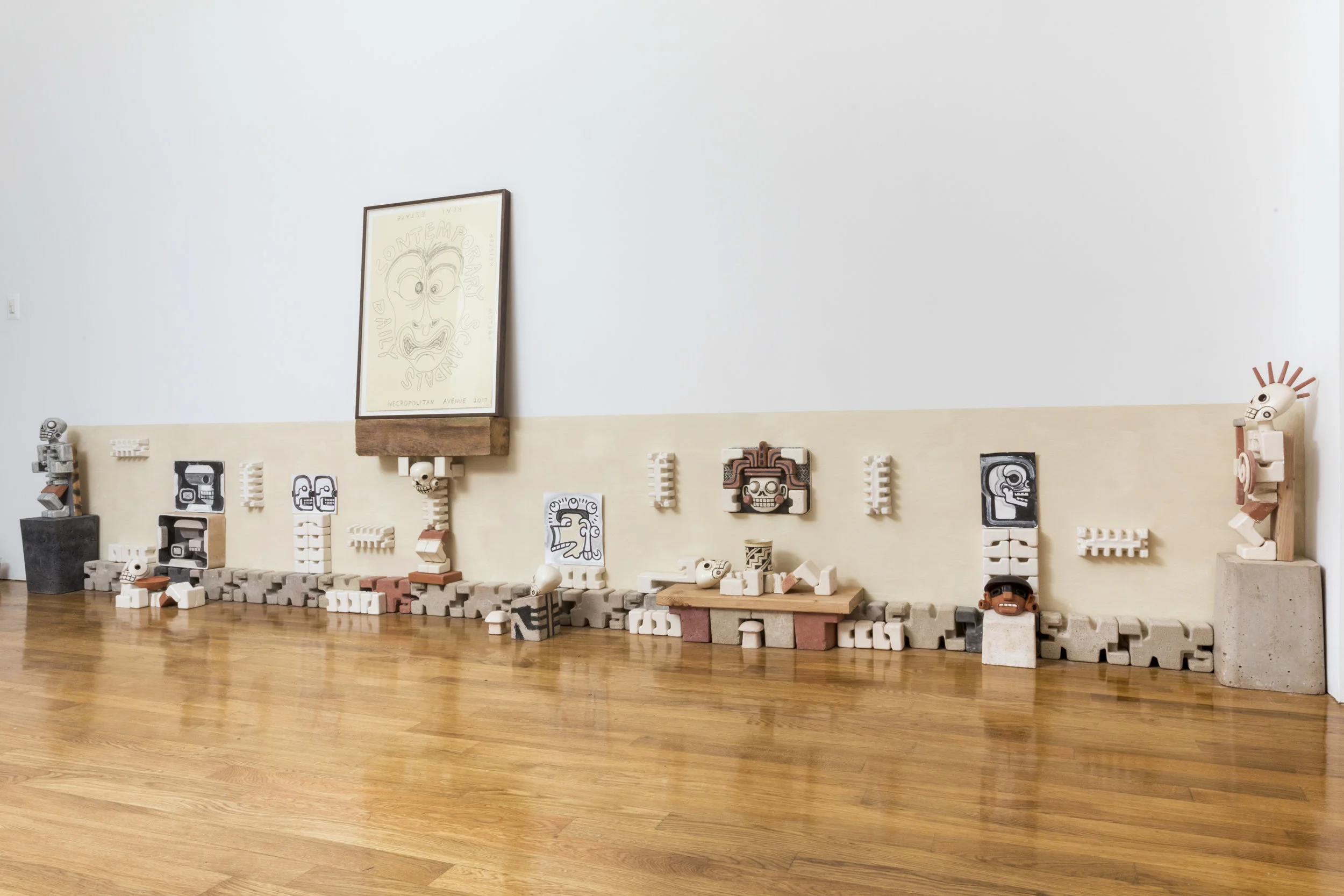 Steve Keister Xibalba Tableau 2.0 2017 Glazed ceramic, cement, acrylic on paper, and wood 30 inches x 16 feet x 12 inches