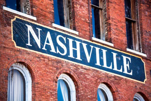 Picture of a painted brick wall that says "Nashville"