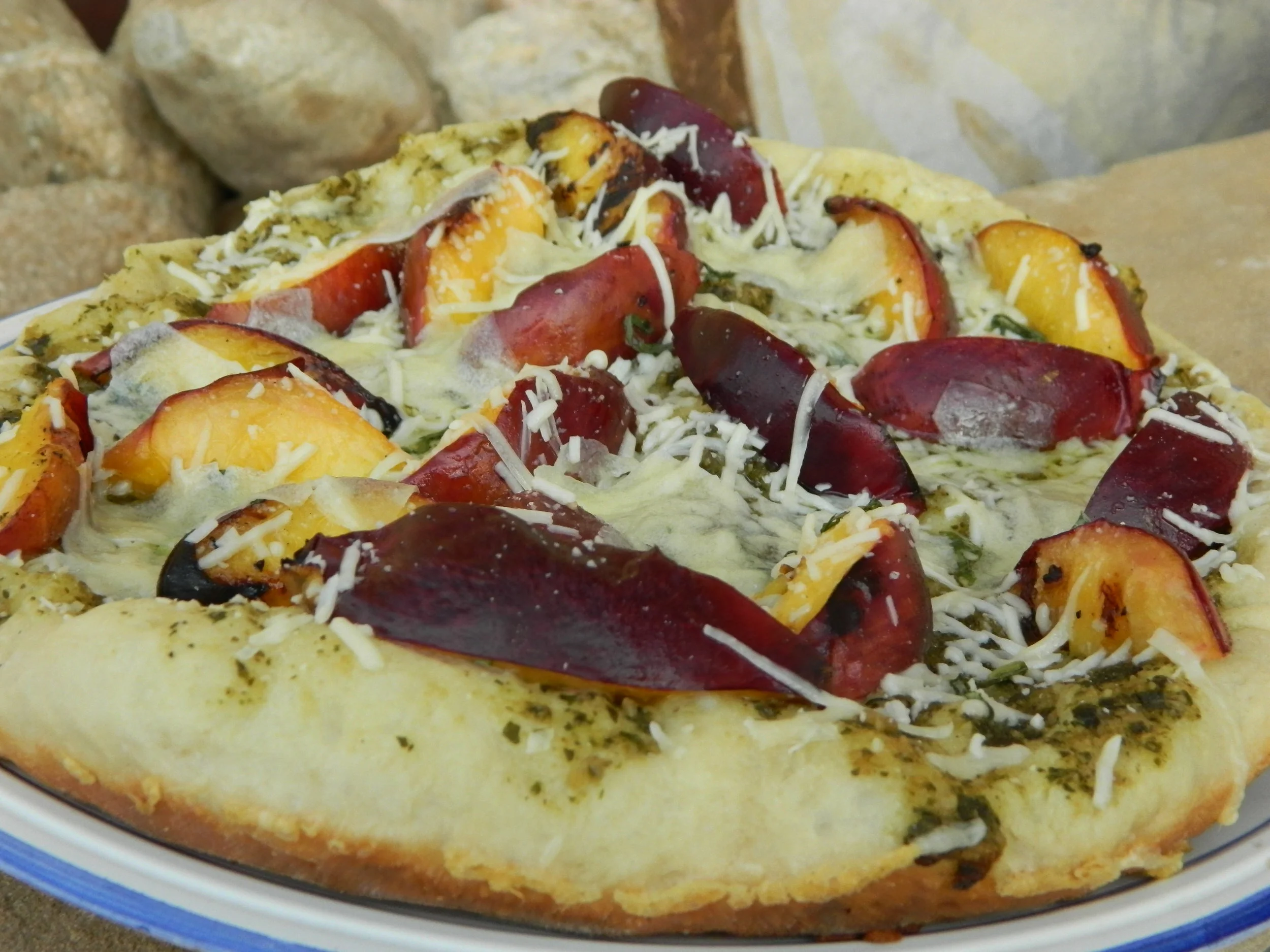  Grilled Palisade Peach and homemade Pesto Flatbread with parmesan cheese&nbsp; 