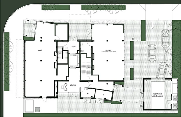 The ground floor houses a café on the west and a credit union on the east. Residents park in a robotic parking garage entered at the southeast corner of the site. (Kaiser Group)