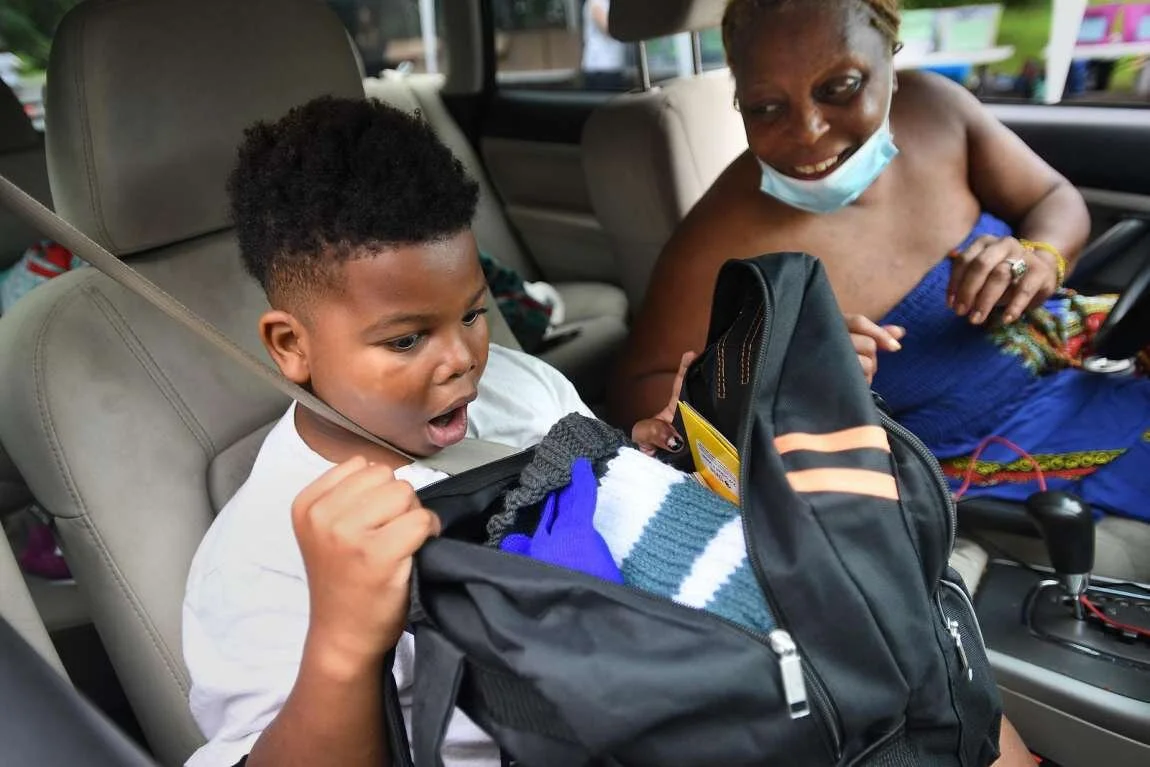 In Photos: Stamford students thrilled to get backpacks, school supplies