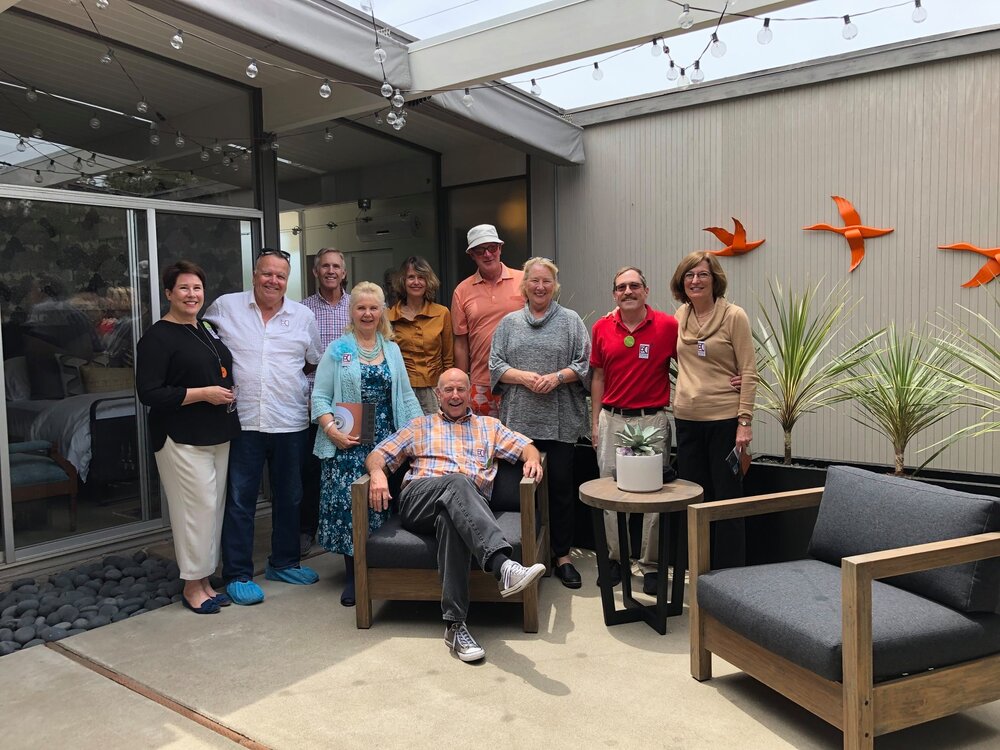 Lead docent, Alan Hess, with happy team of docents