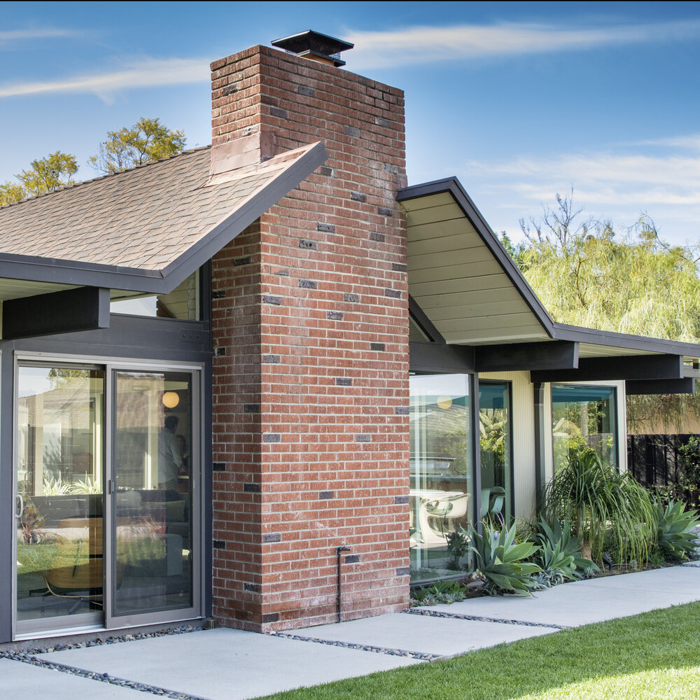 Character-defining feature: Central gable roof of one of the tour homes