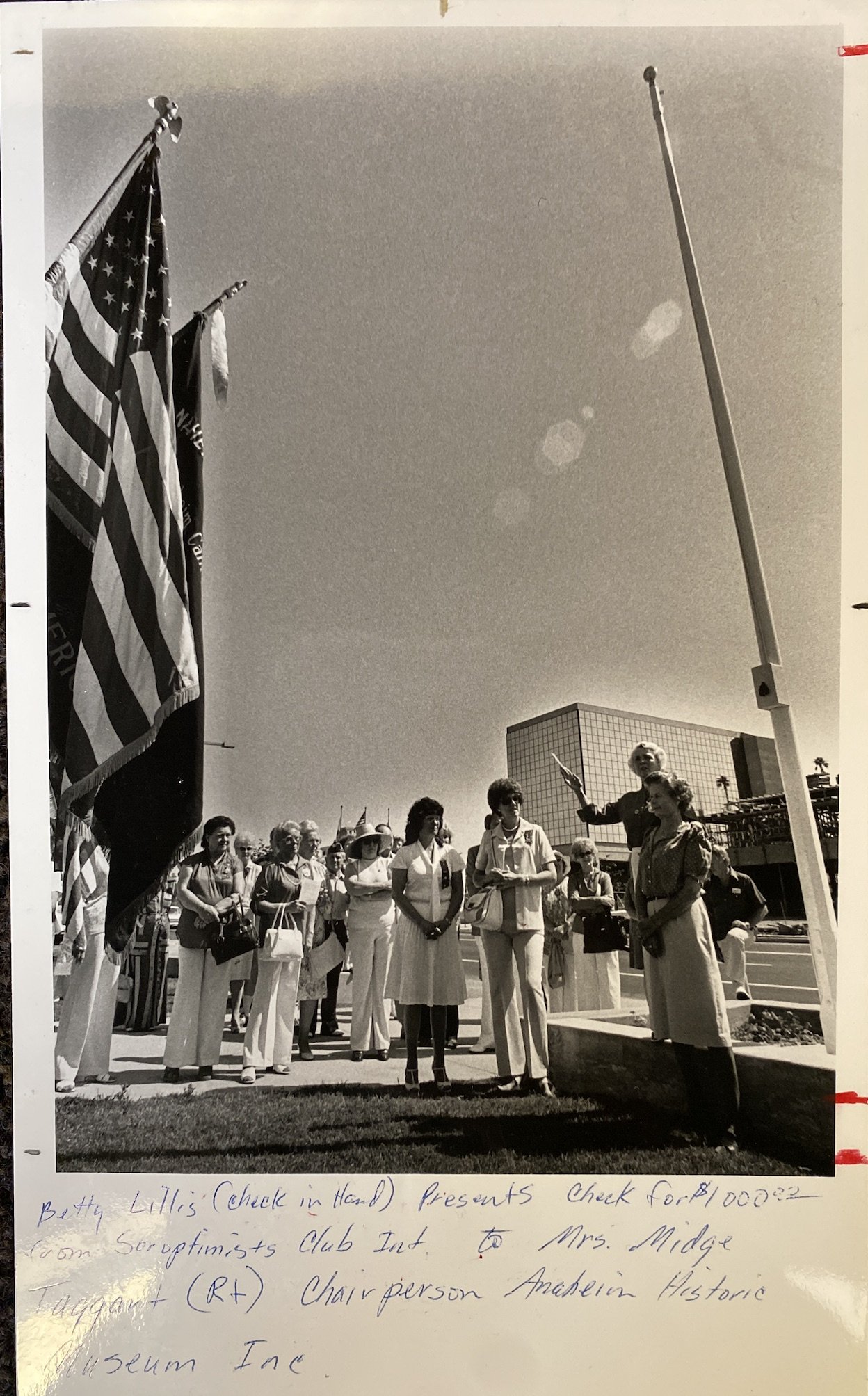  Midge Taggart (standing on grass far right) accepting donation from the Soroptimist Club for the Anaheim Museum, c. 1984. Courtesy of Anaheim Heritage Center.  