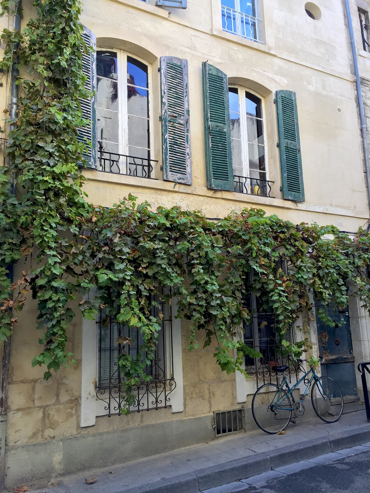 Rue Voltaire. An example of volets persiennés, shutters with louvers.