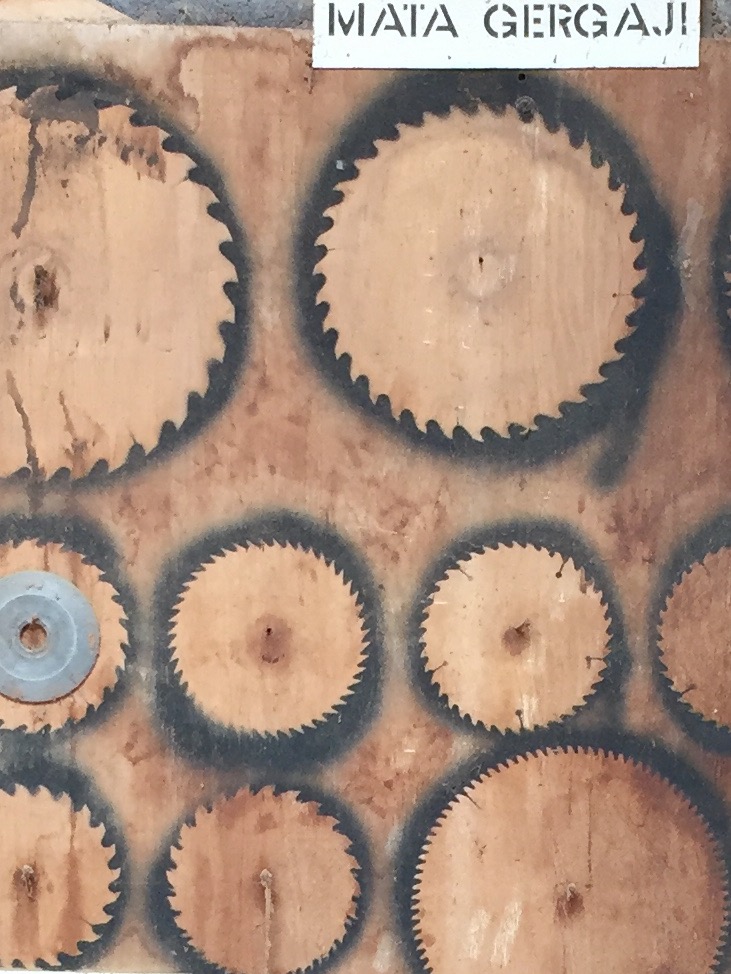 Silhouettes of saw blades like stamps in the passport...