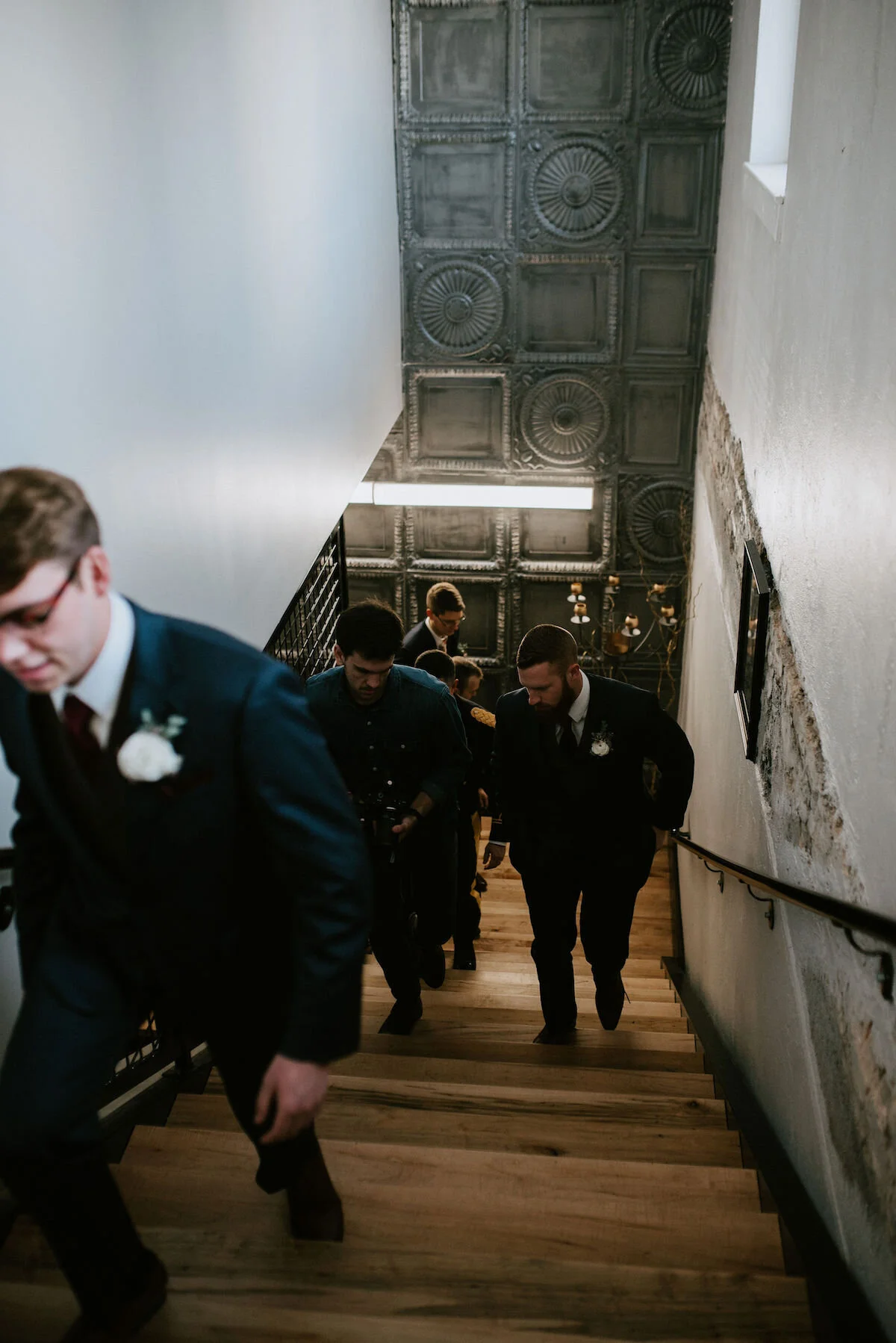 Entry way staircase with repurposed tin tiles