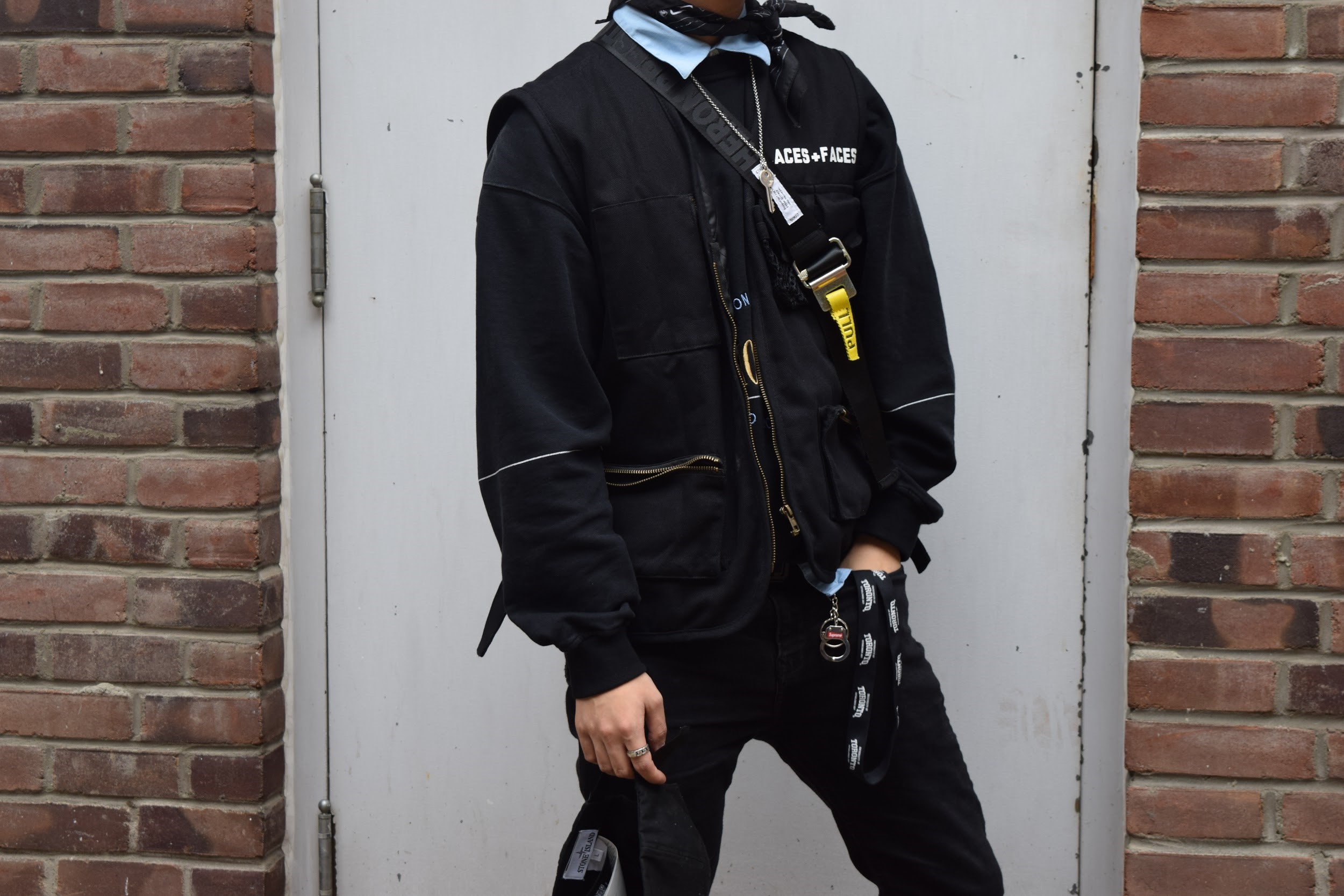 Crewneck: Balenciaga Homme Collection , Tech wear-inspired Vest: Places + Faces