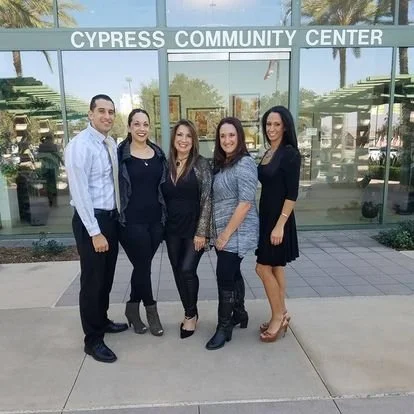 Family in front of the Cypress Community Center.jpg